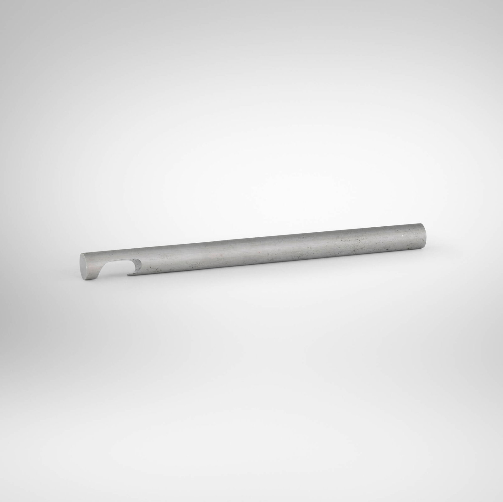 Studio Opi, Bottle opener: Studio Opi Bottle opener Cini & Nils Italy, 1969 brushed chrome-plated steel 6.25 l x 0.5 dia in (16 x 1 cm) An example of this design is in the permanent collection of the Museum of Modern Art, New