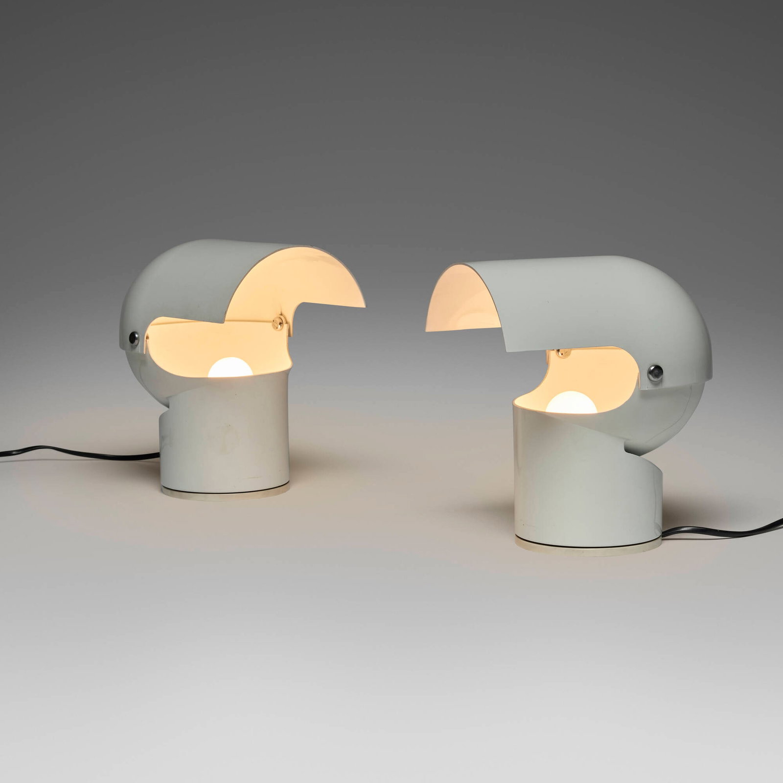 Gae Aulenti, Pileino table lamps, pair: Gae Aulenti Pileino table lamps, pair Artemide Italy, 1972 enameled aluminum, plastic, chrome-plated steel 9.625 h x 7.5 w x 9.75 d in (24 x 19 x 25 cm) Molded manufacturer's mark to underside