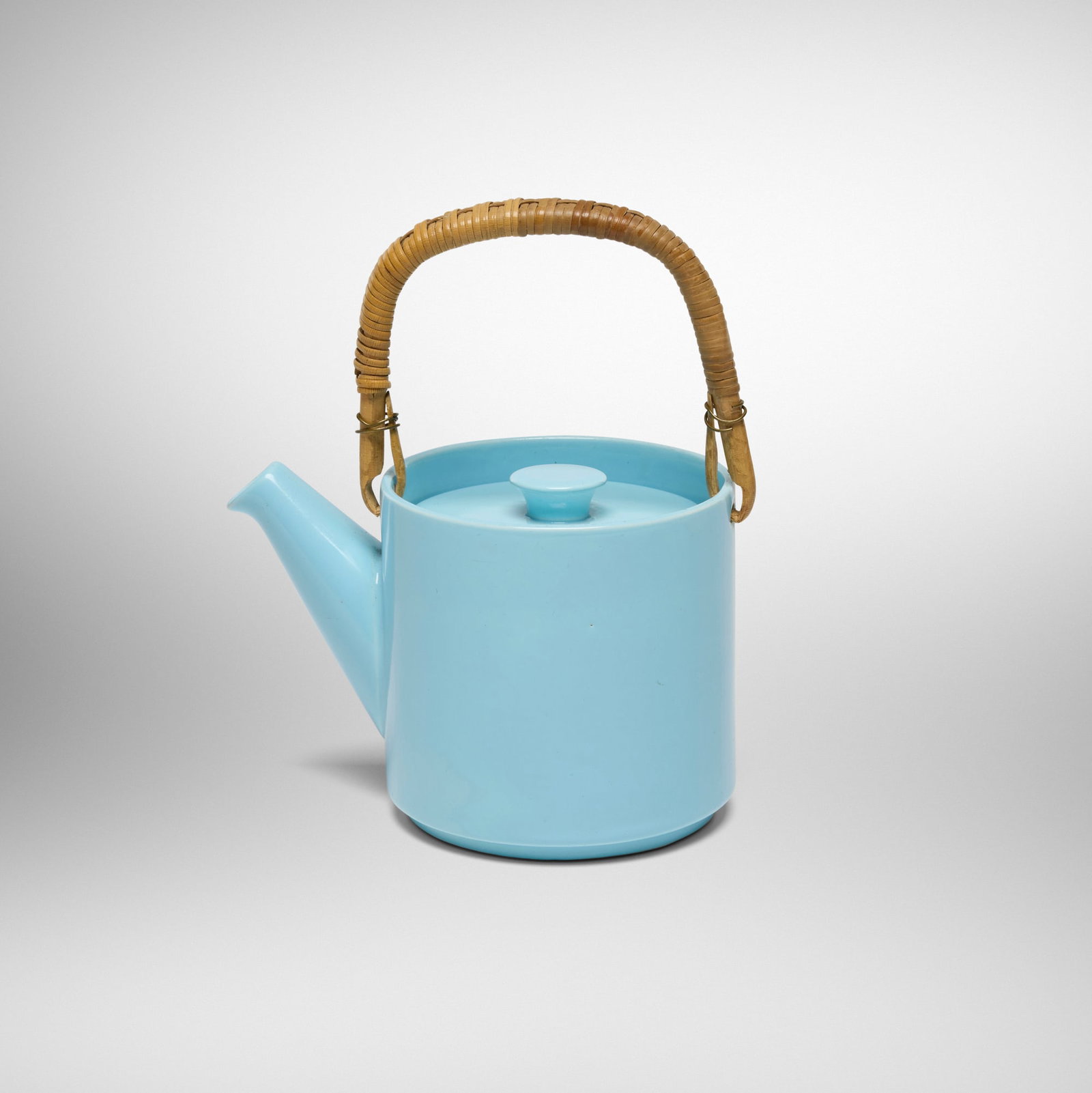Stig Lindberg, Teapot from the Pastella series: Stig Lindberg Teapot from the Pastella series Gustavsberg Sweden, 1953 glazed stoneware, rattan, metal 7.125 h x 4 w x 6.125 d in (18 x 10 x 16 cm) Stamped manufacturer's mark with anchor to