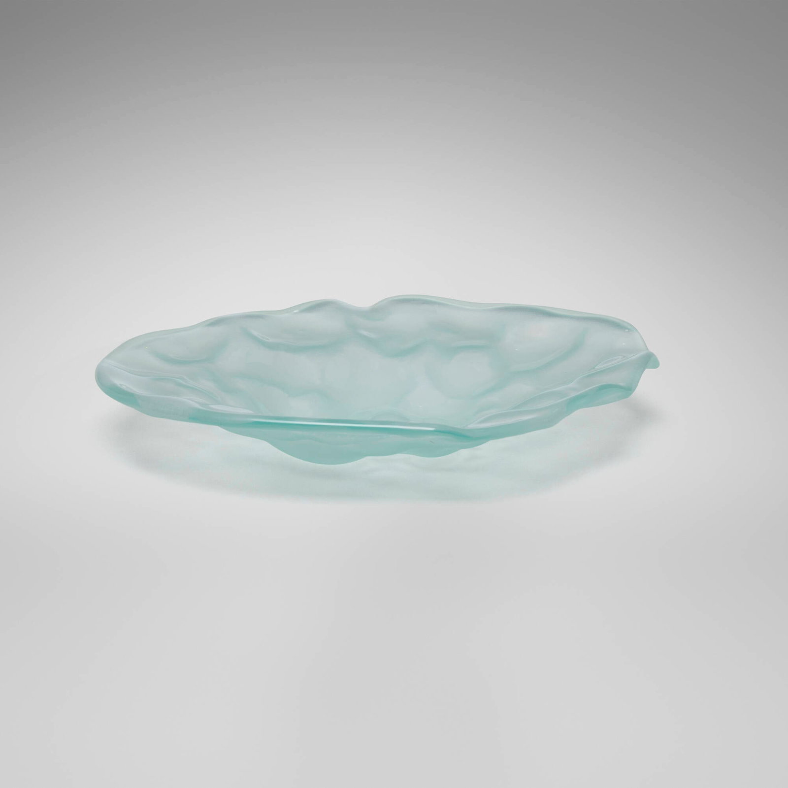 Jim McCullough, Bowl: Jim McCullough Bowl USA, c. 2000 sandblasted glass 1.375 h x 9.75 w x 8 d in (3 x 25 x 20 cm) Incised signature to underside edge 'Jim McCullough'. This work will ship from Chicago,