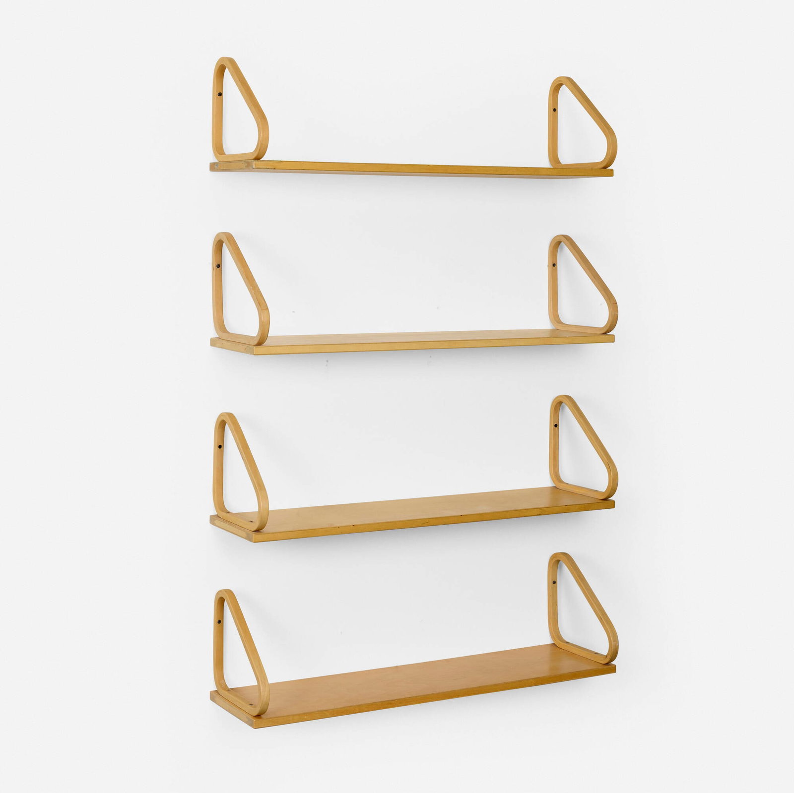 Alvar Aalto, Wall-mounted shelves model 112B, set of four: Alvar Aalto Wall-mounted shelves model 112B, set of four Artek Finland, 1933 / c. 1970 birch 9.75 h x 35.375 w x 9.875 d in (25 x 90 x 25 cm) Shelves can be installed in a variety of confi