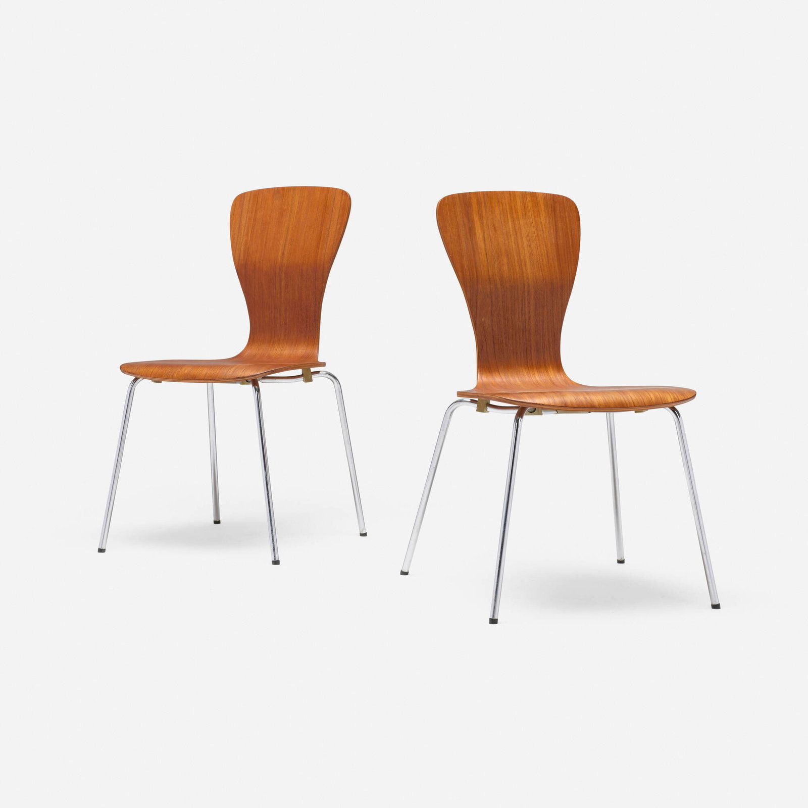 Tapio Wirkkala, Nikke chairs model 9019, pair: Tapio Wirkkala Nikke chairs model 9019, pair Asko Finland, 1958 molded teak plywood, chrome-plated steel 33 h x 17.5 w x 19.5 d in (84 x 44 x 50 cm) Decal manufacturer's label to unde