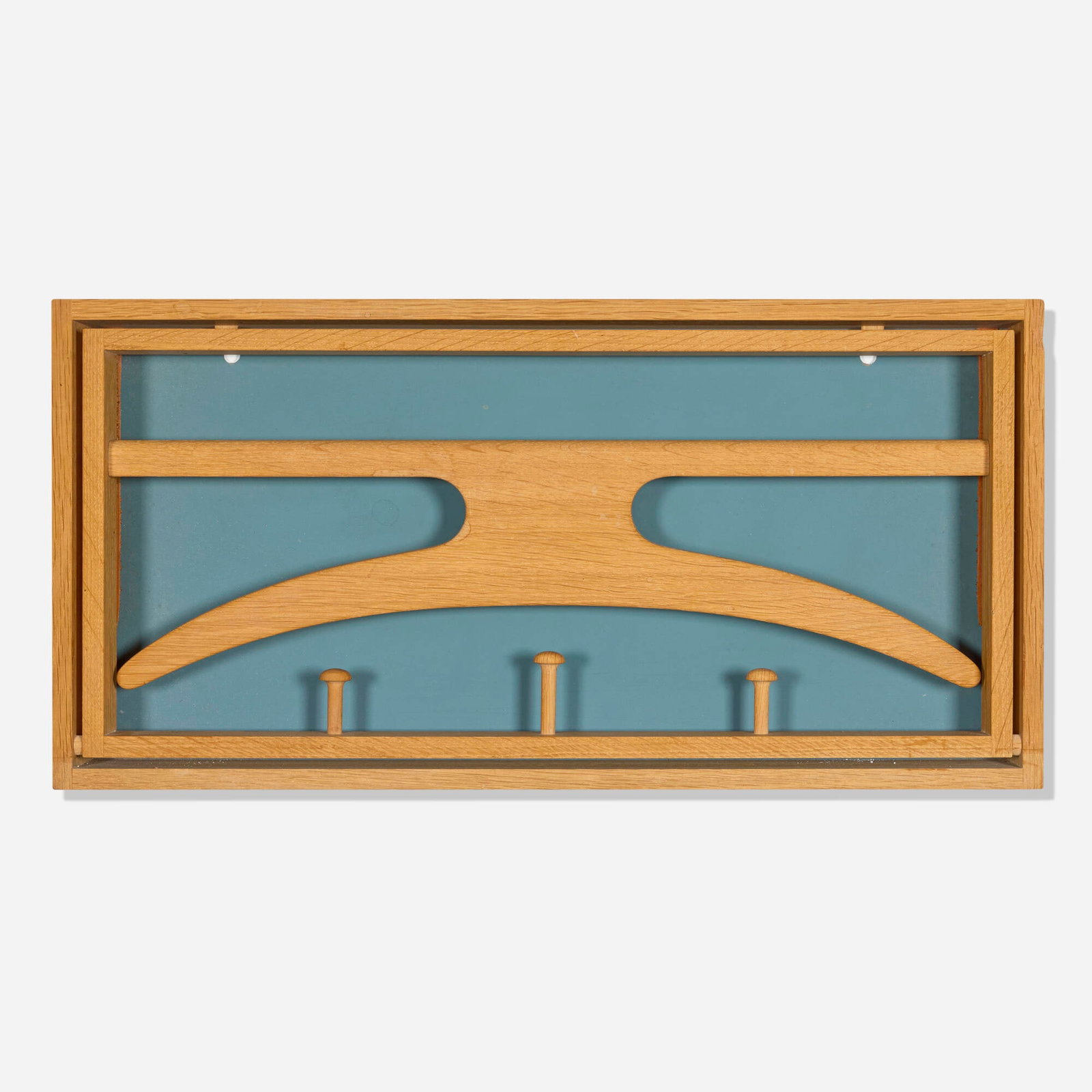 Adam Hoff and Poul Ostergaard, Wall-mounted valet: Adam Hoff and Poul Ostergaard Wall-mounted valet Virum Mobelsnedkeri Denmark, c. 1960 oak, lacquered Masonite, leather 16 h x 21.875 w x 11.375 d in (41 x 56 x 29 cm) Paper manufacturer�