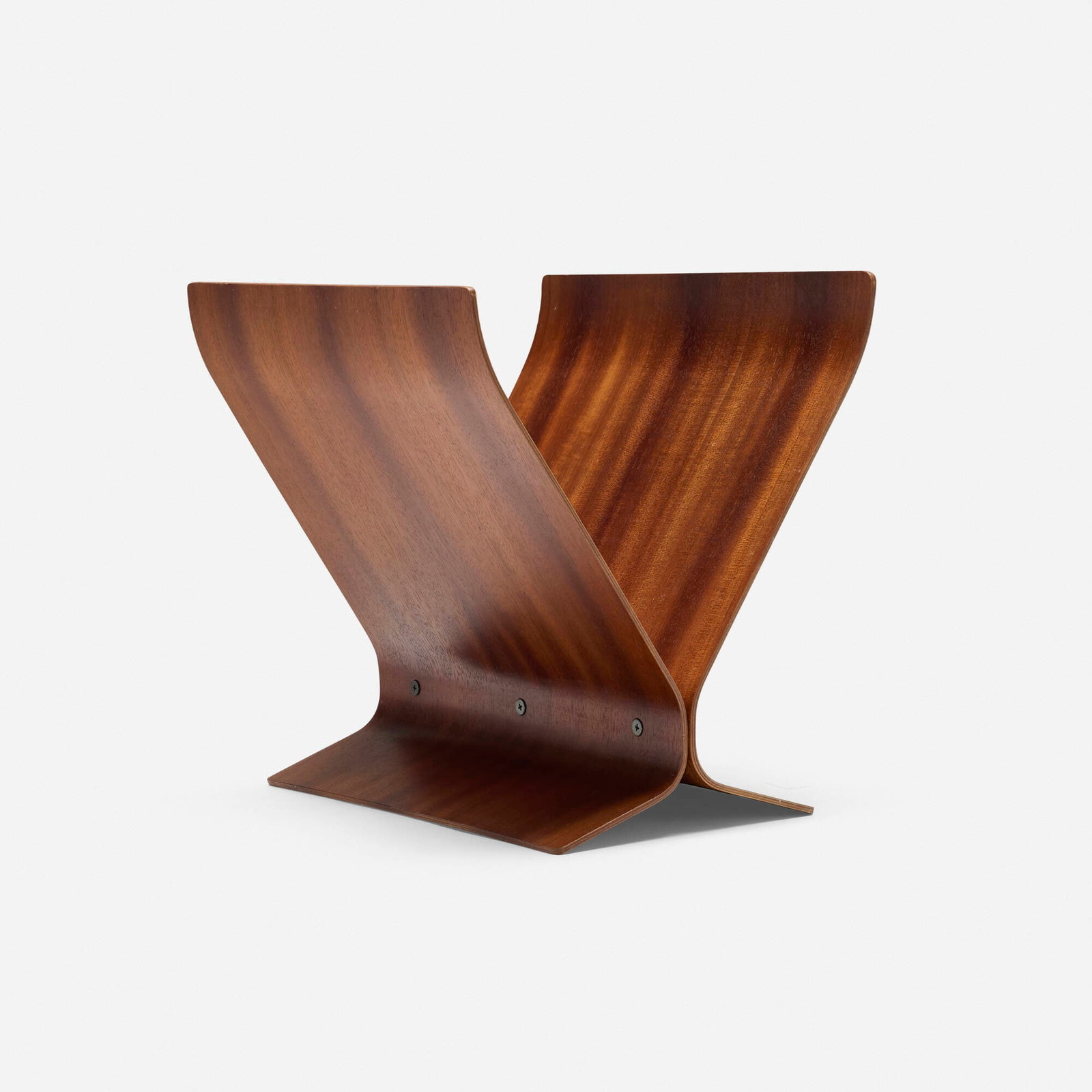 Paul Rowan, Magazine stand: Paul Rowan Magazine stand Umbra Canada, c. 1985 mahogany plywood 14.75 h x 15.75 w x 13 d in (37 x 40 x 33 cm) Literature: Umbra 40, manufacturer's catalog,