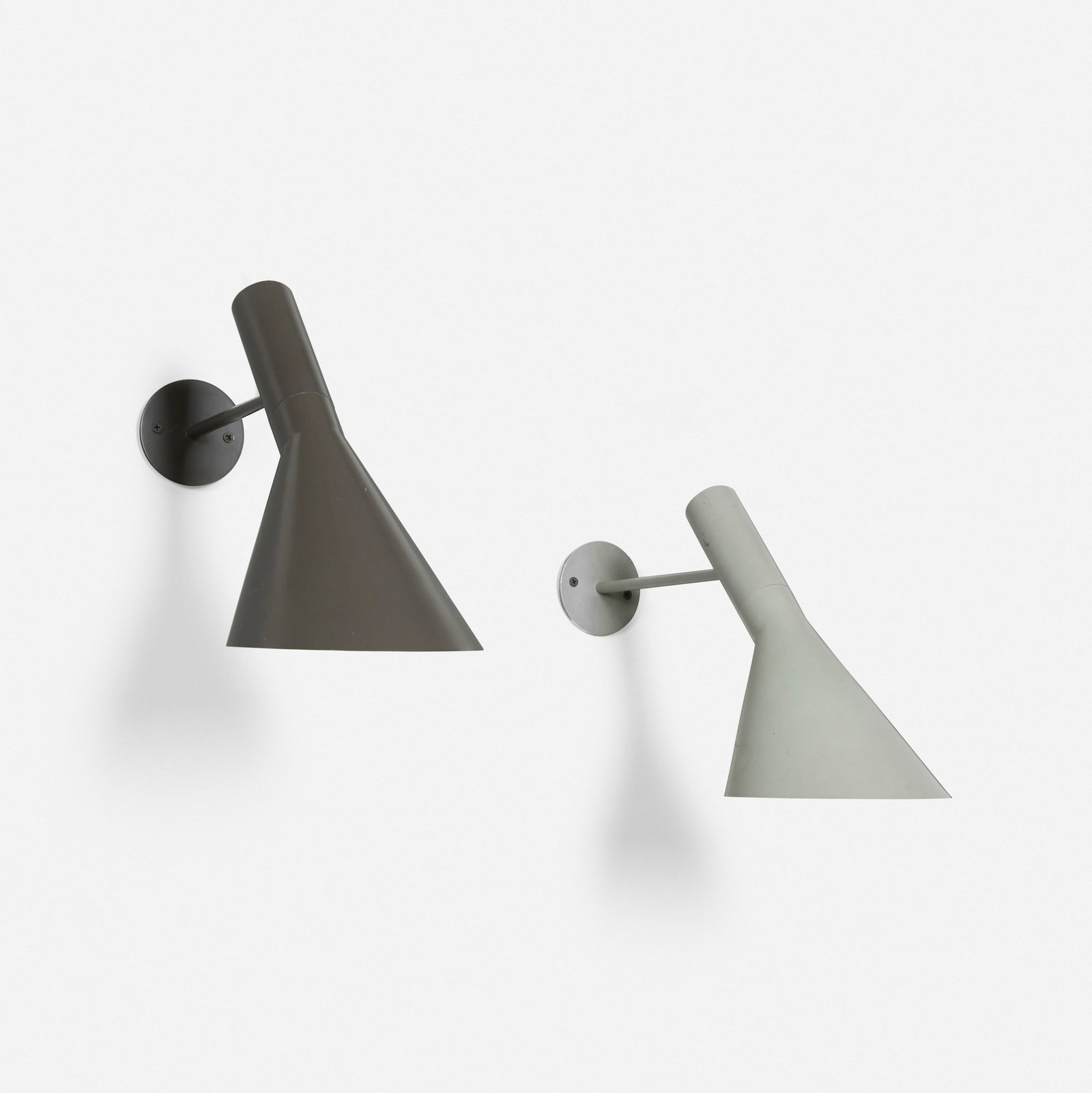 Arne Jacobsen, AJ wall lamps for the SAS Royal Hotel, set of two: Arne Jacobsen AJ wall lamps for the SAS Royal Hotel, set of two Louis Poulsen Denmark, 1957 lacquered steel 13.5 h x 6.375 w x 8.5 d in (34 x 16 x 22 cm) This design was created for the SA