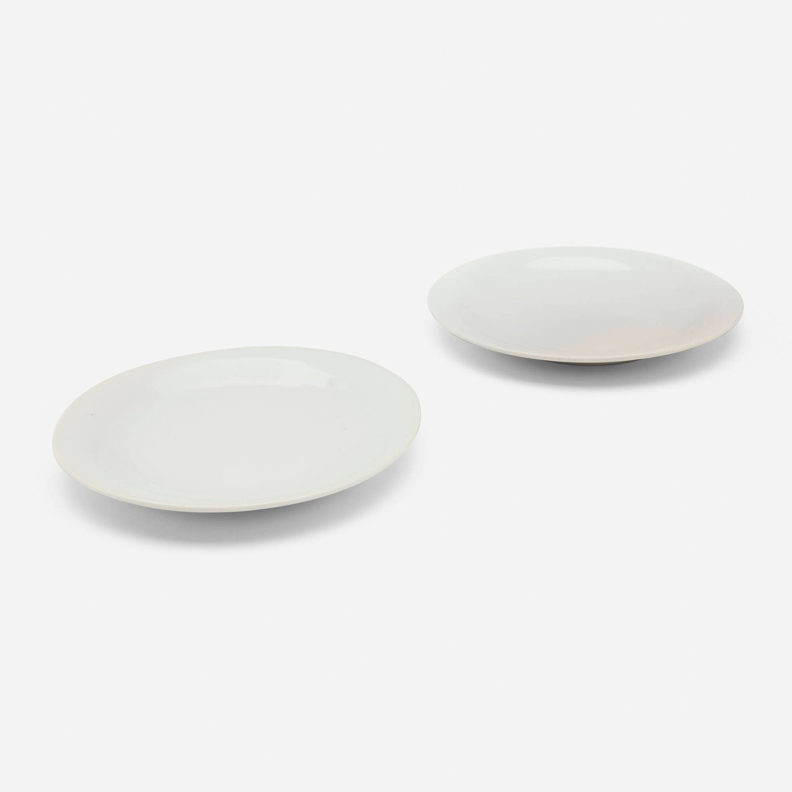 Sori Yanagi, Plates, set of two: Sori Yanagi Plates, set of two Japan, late 20th century glazed porcelain 0.875 h x 7.5 w x 7 d in (2 x 19 x 18 cm) Stamped manufacturer's mark to underside of each example 'Y'.