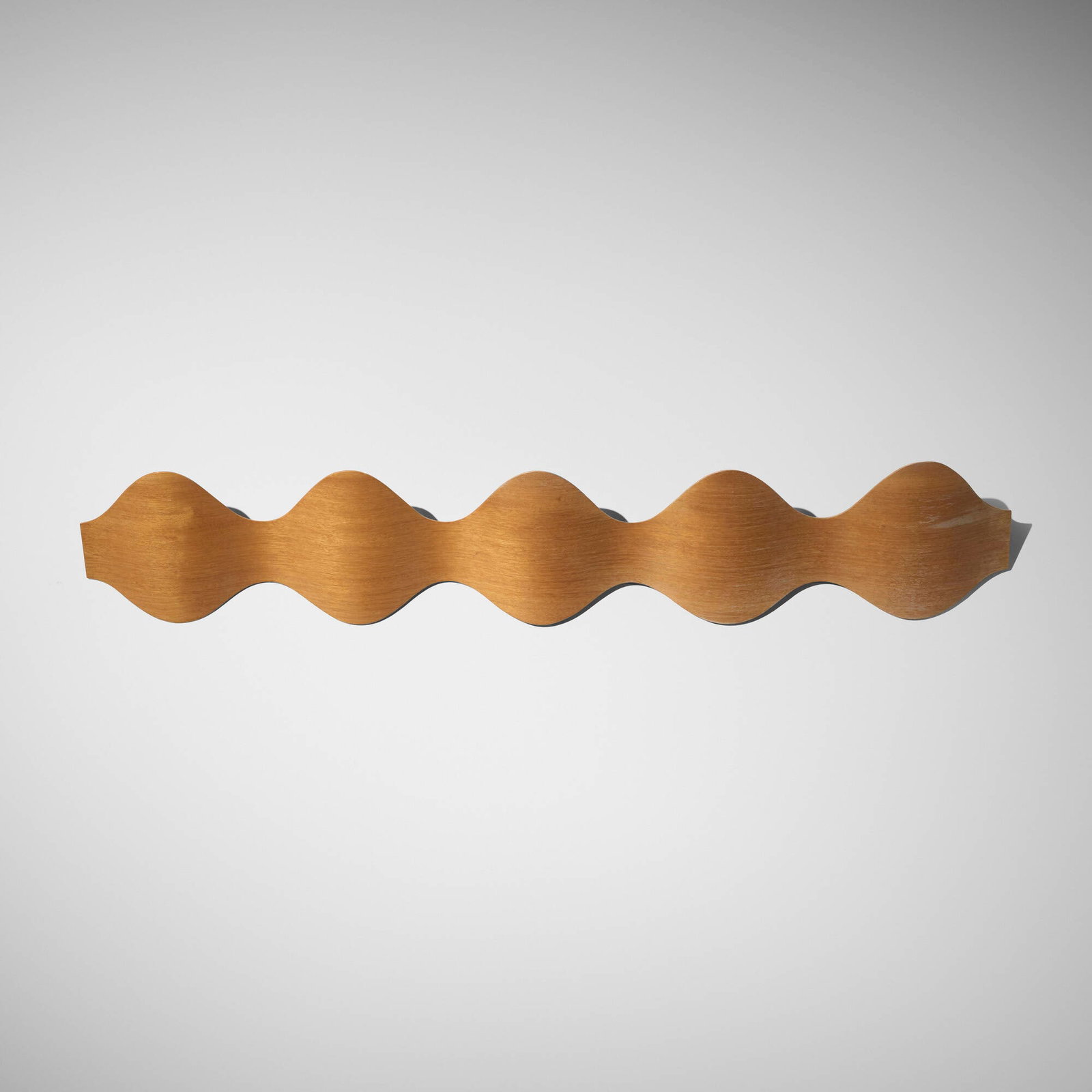 Montse Padros and Carlos Riart, Ona coatrack: Montse Padros and Carlos Riart Ona coatrack Mobles 114 Spain, 1992 laminated mahogany and beech 7.25 h x 28.25 w x 3.75 d in (18 x 72 x 10 cm) An example of this design is in the permanent