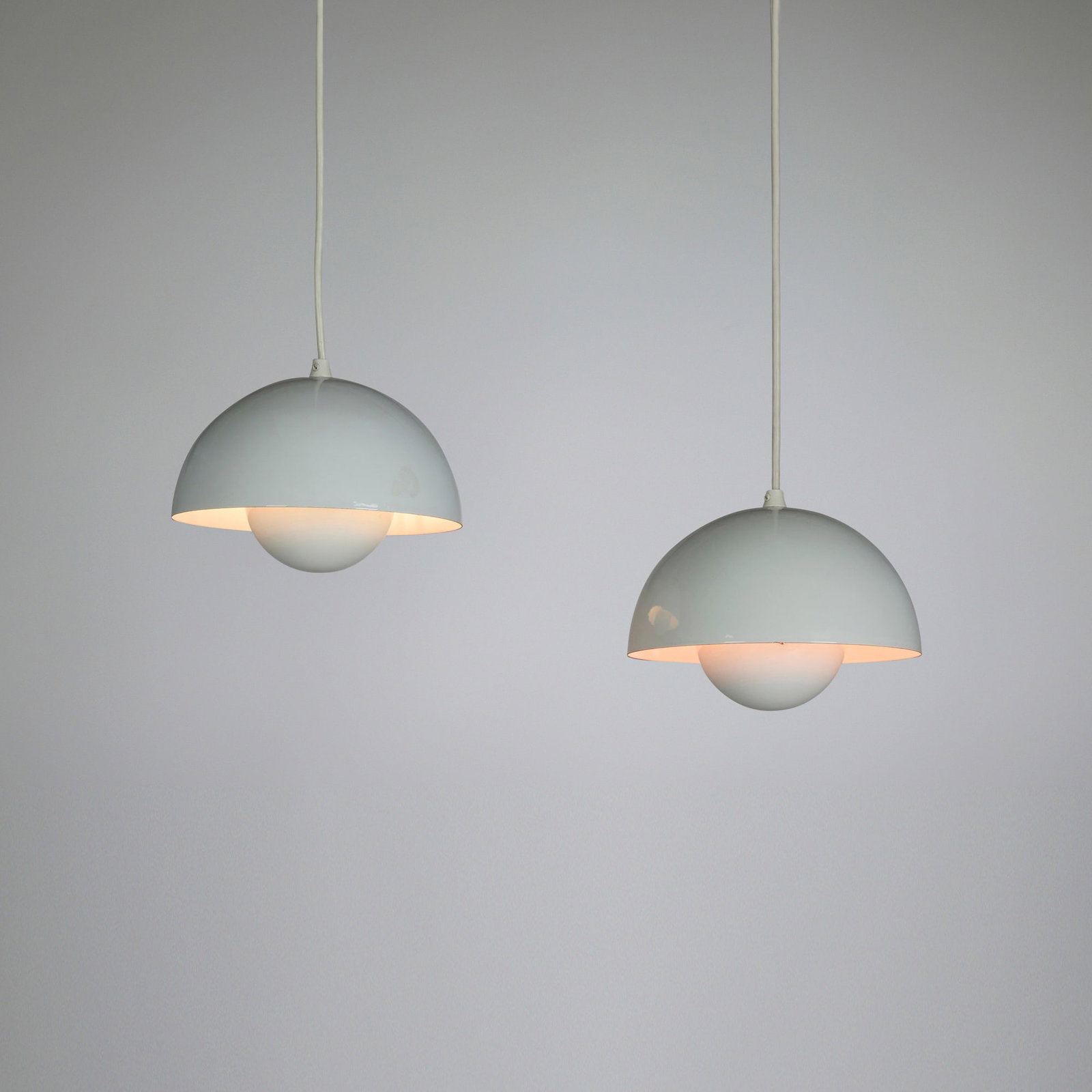 Verner Panton, Flowerpot lamps, pair: Verner Panton Flowerpot lamps, pair Louis Poulsen Denmark, 1968 enameled steel 6 h x 9 dia in (15 x 23 cm) Paper manufacturer's label to interior of shade to one example 'Flowerp