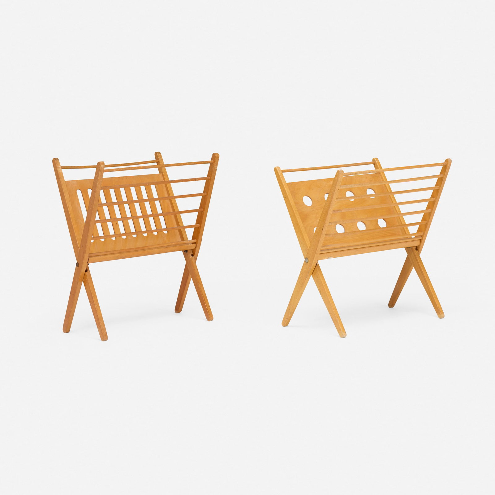 Cees Braakman, Magazine racks, set of two: Cees Braakman Magazine racks, set of two UMS-Pastoe The Netherlands, c. 1955 beech, beech plywood 21.25 h x 17.5 w x 12.125 d in (54 x 44 x 31 cm) 19.5 h x 17.5 w x 13.625 d in (50 x 44 x 35 cm) This