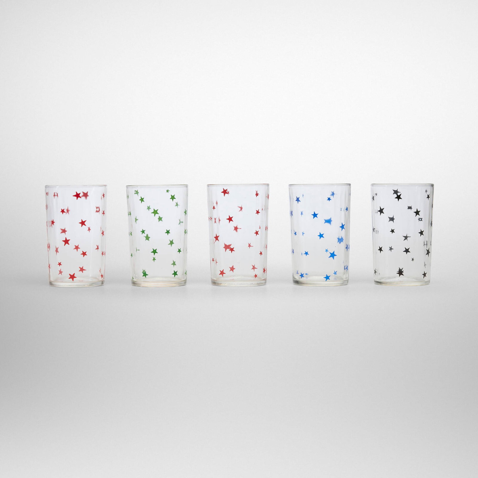Hazel Atlas Company for Kraft Foods, Swankyswig glasses, set of five: Hazel Atlas Company for Kraft Foods Swankyswig glasses, set of five USA, c. 1965 screenprint in colors on glass 3.5 h x 2.25 dia in (9 x 6 cm) Swankyswig glassware was designed for packaged foods