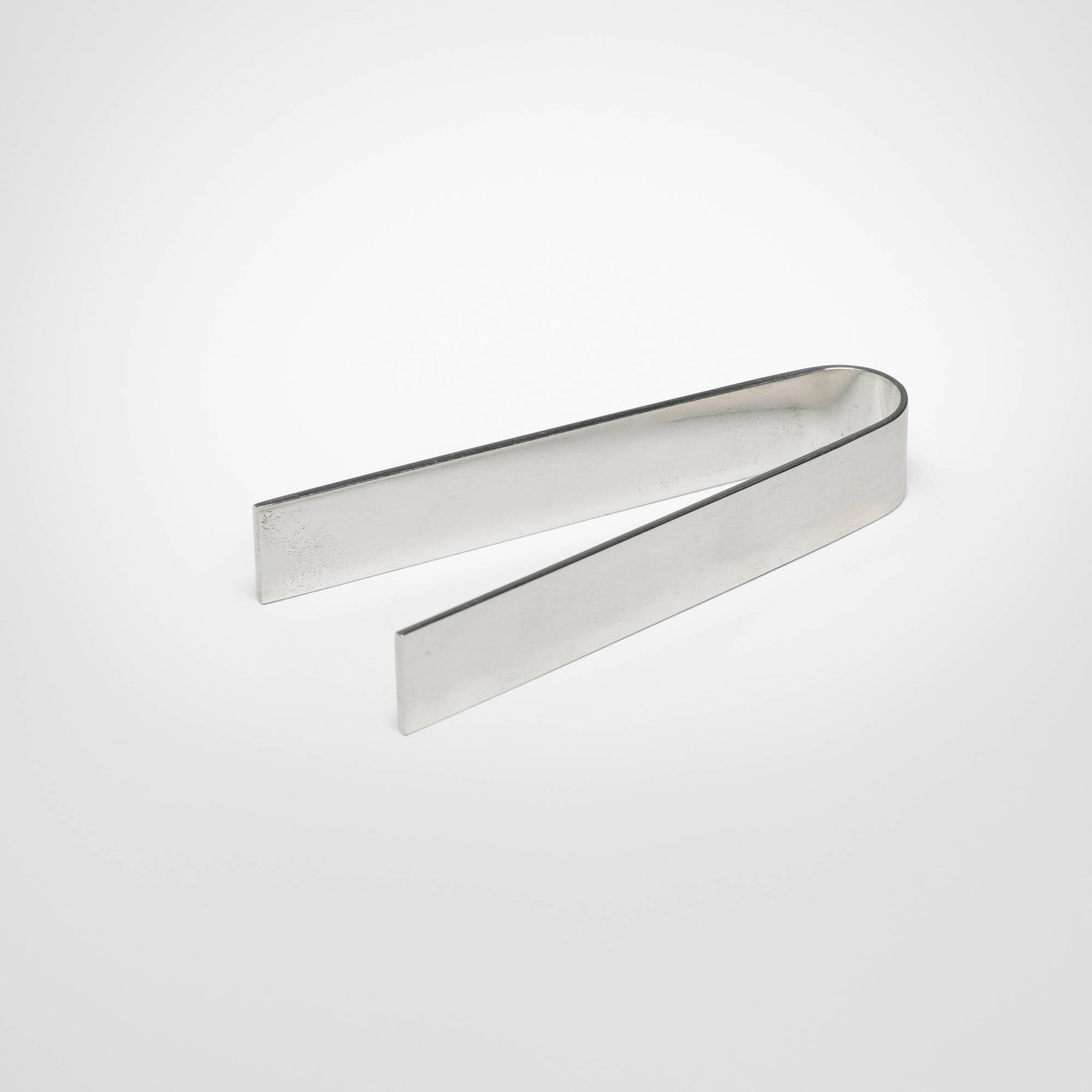 Wiwen Nilsson, Sugar tongs: Wiwen Nilsson Sugar tongs Sweden, 1964 sterling silver 3.25 h x 1.25 w x 0.5 d in (8 x 3 x 1 cm) Impressed signature and touchmarks to underside 'Wiwen Nilsson'. T