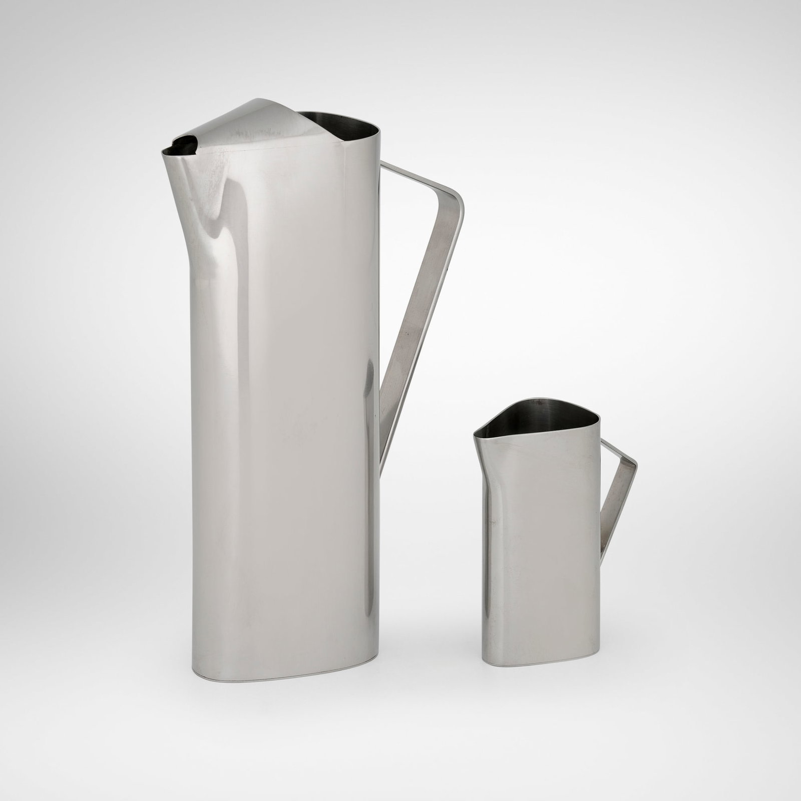 Lundofte, Pitcher and creamer: Lundofte Pitcher and creamer c. 1965 10.5 h x 6 w x 2.5 d in (27 x 15 x 6 cm) 4.5 h x 3.5 w x 2 d in (11 x 9 x 5 cm) Impressed manufacturer's mark to underside of each example 'Denmark