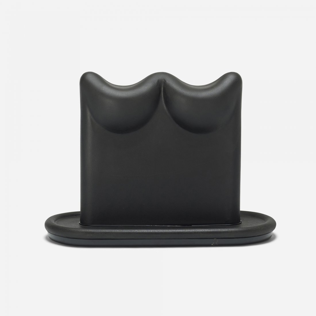 Ezio Didone Pollicino ottoman: Ezio Didone Pollicino ottoman Selle Regina for Gruppo Industriale Busnelli S.P.A. Italy, 1976 foam, plastic 22.25 w x 9 d x 15.75 h inches Sold with original box. Signed with printed manufacturer's ma