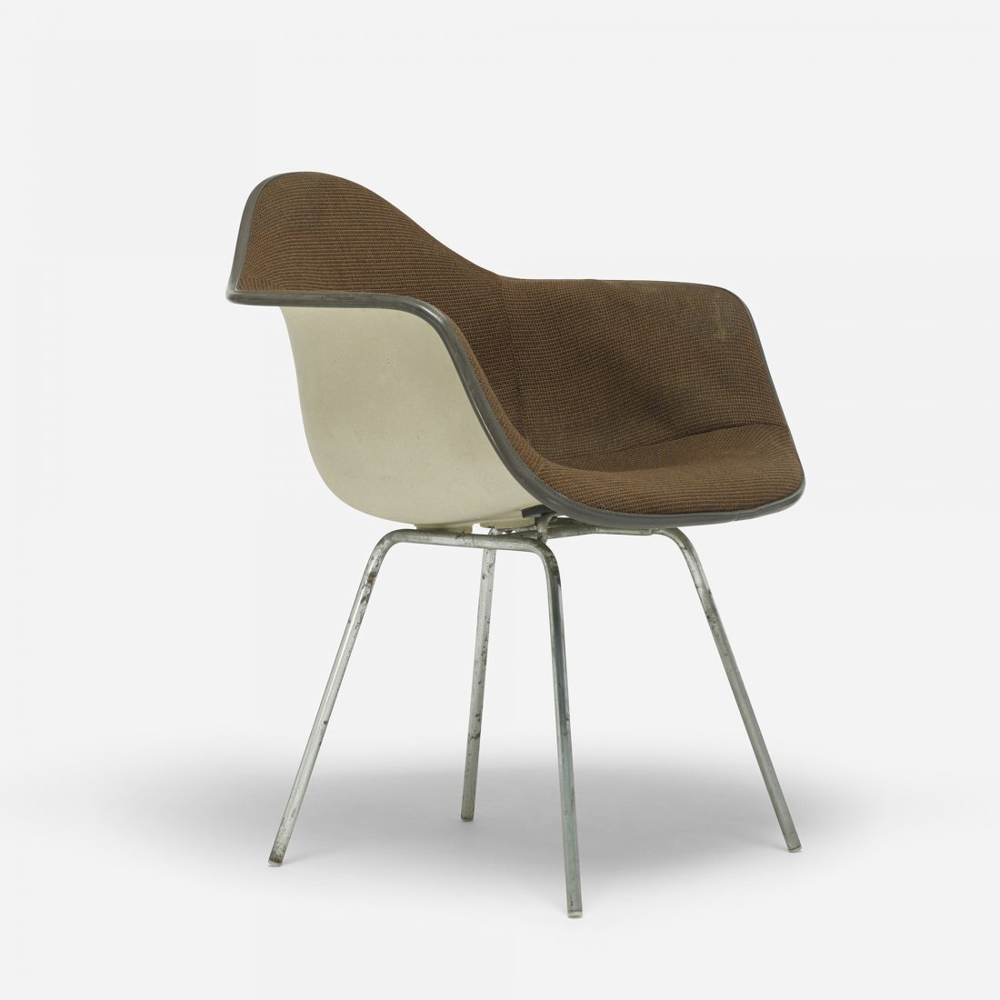 Charles and Ray Eames DAX: Charles and Ray Eames DAX Herman Miller USA, 1950 lacquered fiberglass, upholstery, chrome-plated steel, rubber 25.25 w x 23.5 d x 31 h inches Literature: Eames Design: The Work of the Office of Charl
