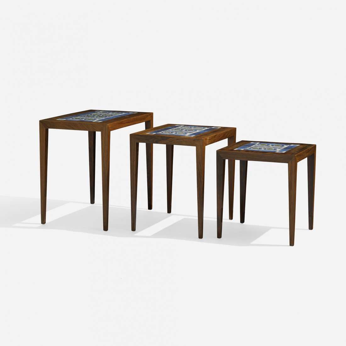 Hansen and Thorsson nesting tables, set of three: Severin Hansen Jr. and Nils Thorsson nesting tables, set of three Haslev Møbelsnedkeri A/S Denmark, c. 1960 rosewood, glazed ceramic 22.5 w x 14.5 d x 20.4 h inches Signed with Danish control tag to