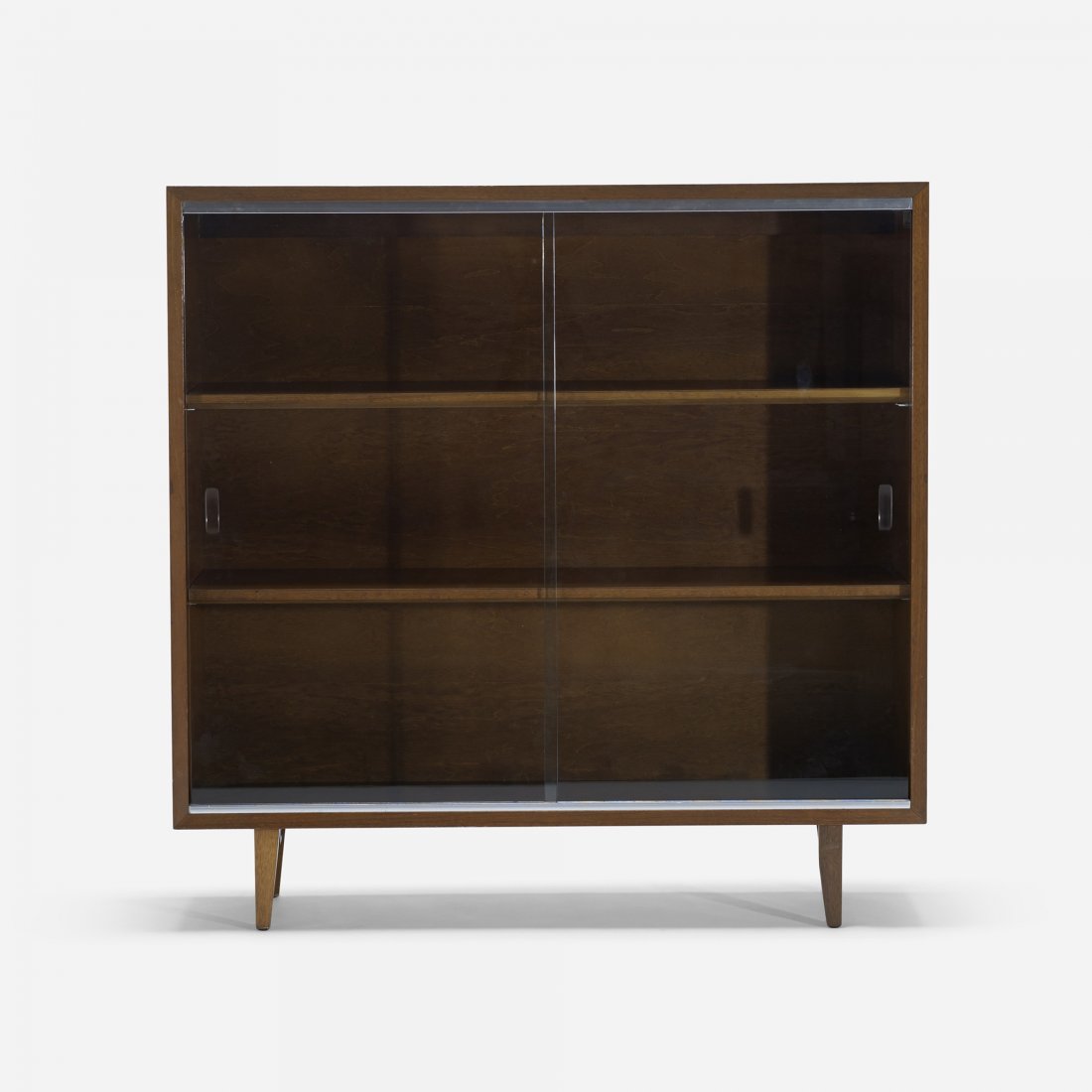 George Nelson & Associates bookcase: George Nelson & Associates bookcase Herman Miller USA, 1950 walnut, glass, aluminum 40 w x 12 d x 39.75 h inches Bookcase features two sliding glass doors and two adjustable shelves. Signed with appli