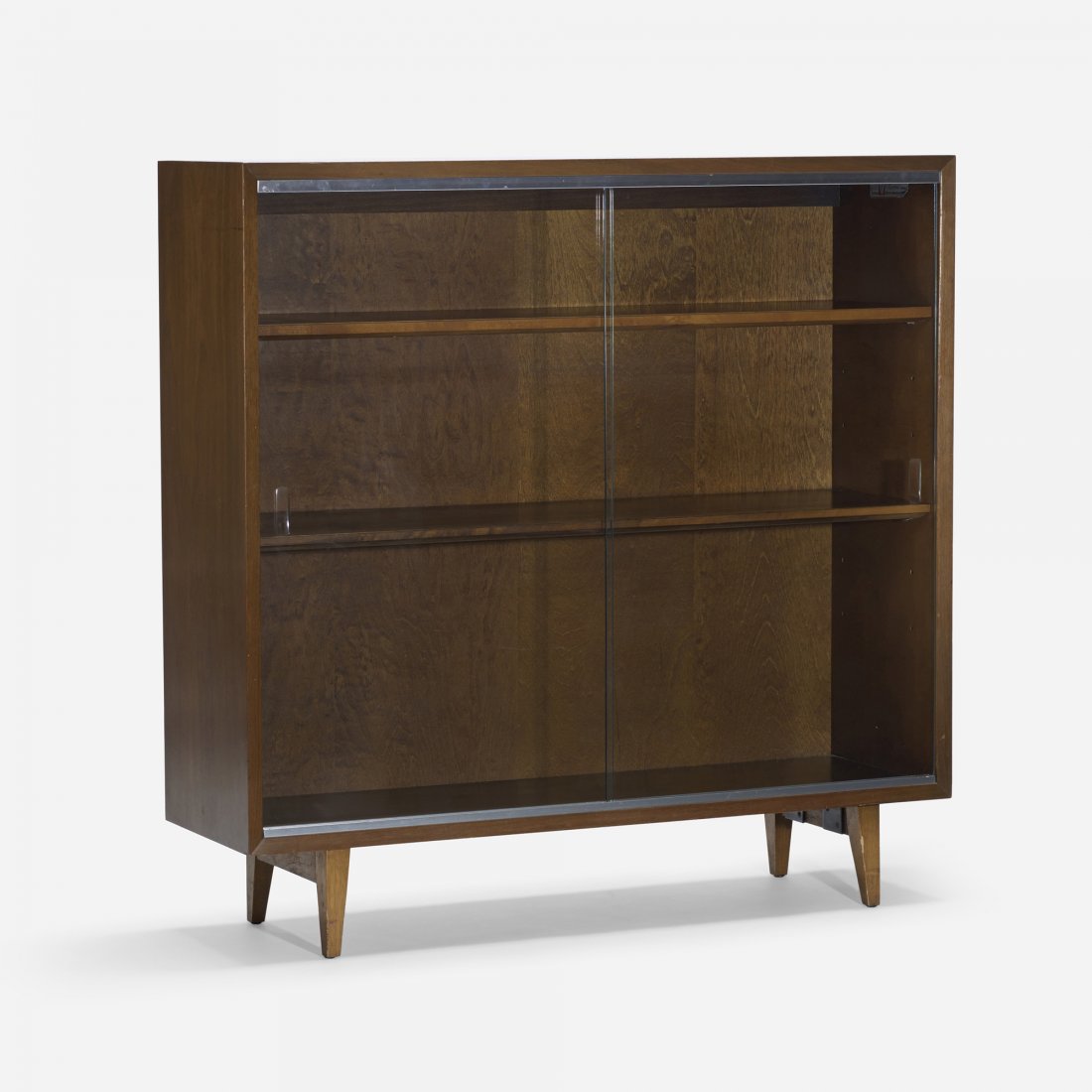 George Nelson & Associates bookcase: George Nelson & Associates bookcase Herman Miller USA, 1950 walnut, glass, aluminum 40 w x 12 d x 39.75 h inches Bookcase features two sliding glass doors and two adjustable shelves. Signed with appli