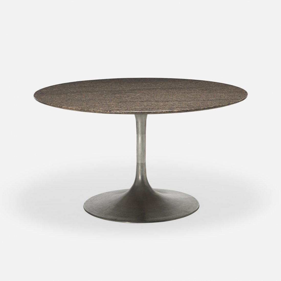 After Eero Saarinen dining table: After Eero Saarinen dining table Burke USA, c. 1980 granite, cast aluminum 54 dia x 29.5 h inches