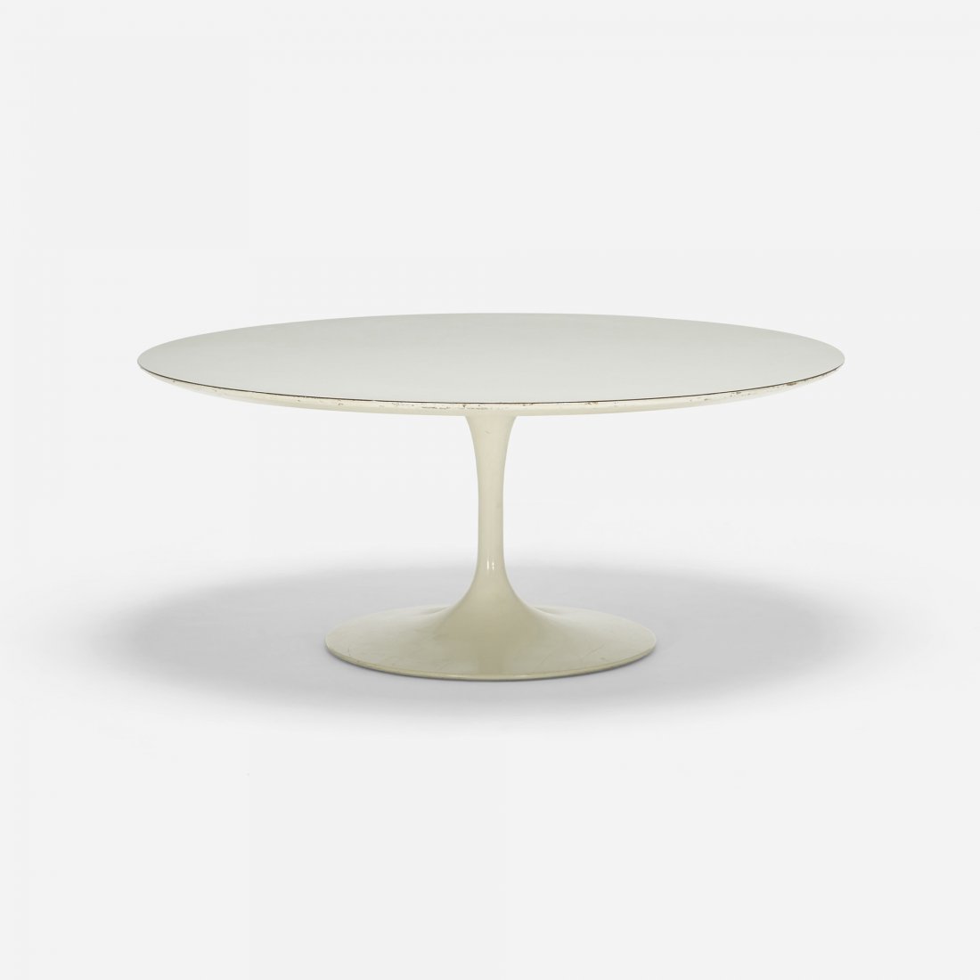Eero Saarinen Tulip coffee table: Eero Saarinen Tulip coffee table Knoll Associates USA, 1957 enameled aluminum, laminate 36 dia x 15 h inches Signed with decal manufacturer's label to underside: [Knoll Associates Inc]. Literature: Kn