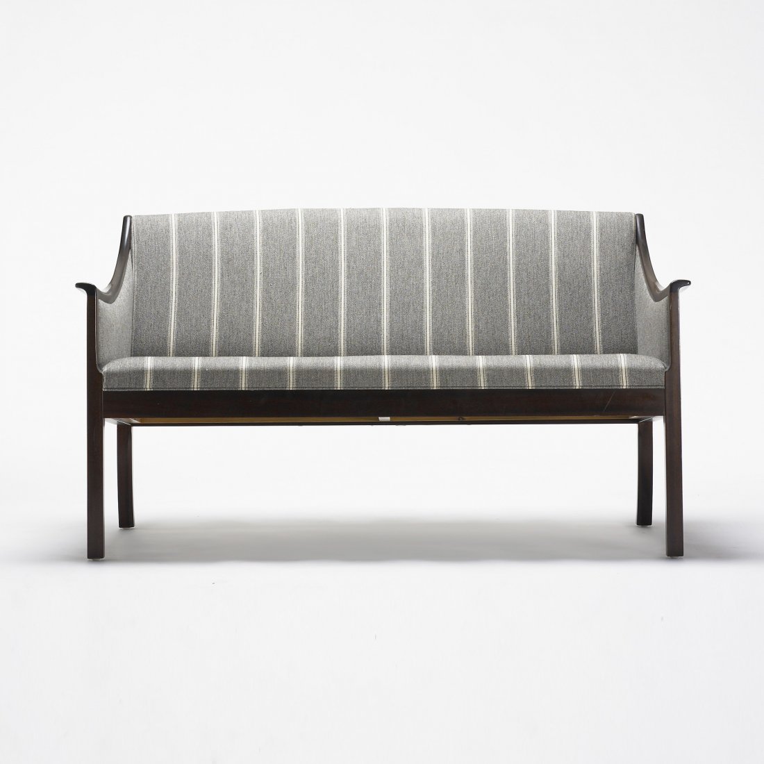 Ole Wanscher sofa: Ole Wanscher sofa Poul Jeppesen Denmark, c. 1960 lacquered mahogany, upholstery 50.75 w x 28 d x 29.5 h inches Signed with disc manufacturer's label to underside: [Made in Denmark Design Ole Wanscher 