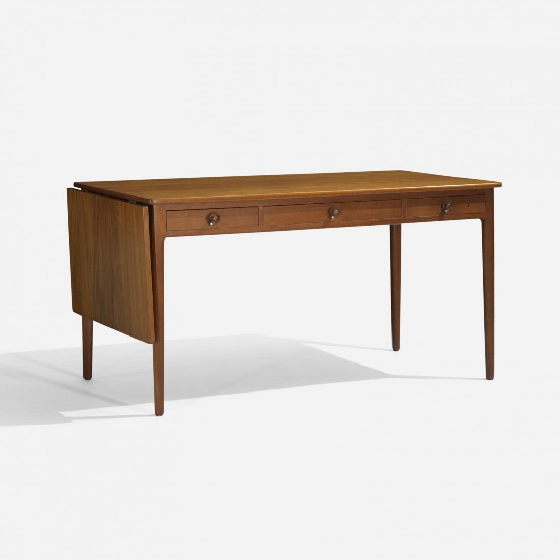 Hans Wegner desk: Hans Wegner desk Andreas Tuck Denmark, c. 1960 teak, brass 54.25 w x 30 d x 28.5 h inches Desk features three drawers and one 18-inch drop-leaf extension; desk measures 72.5 inches when fully extended