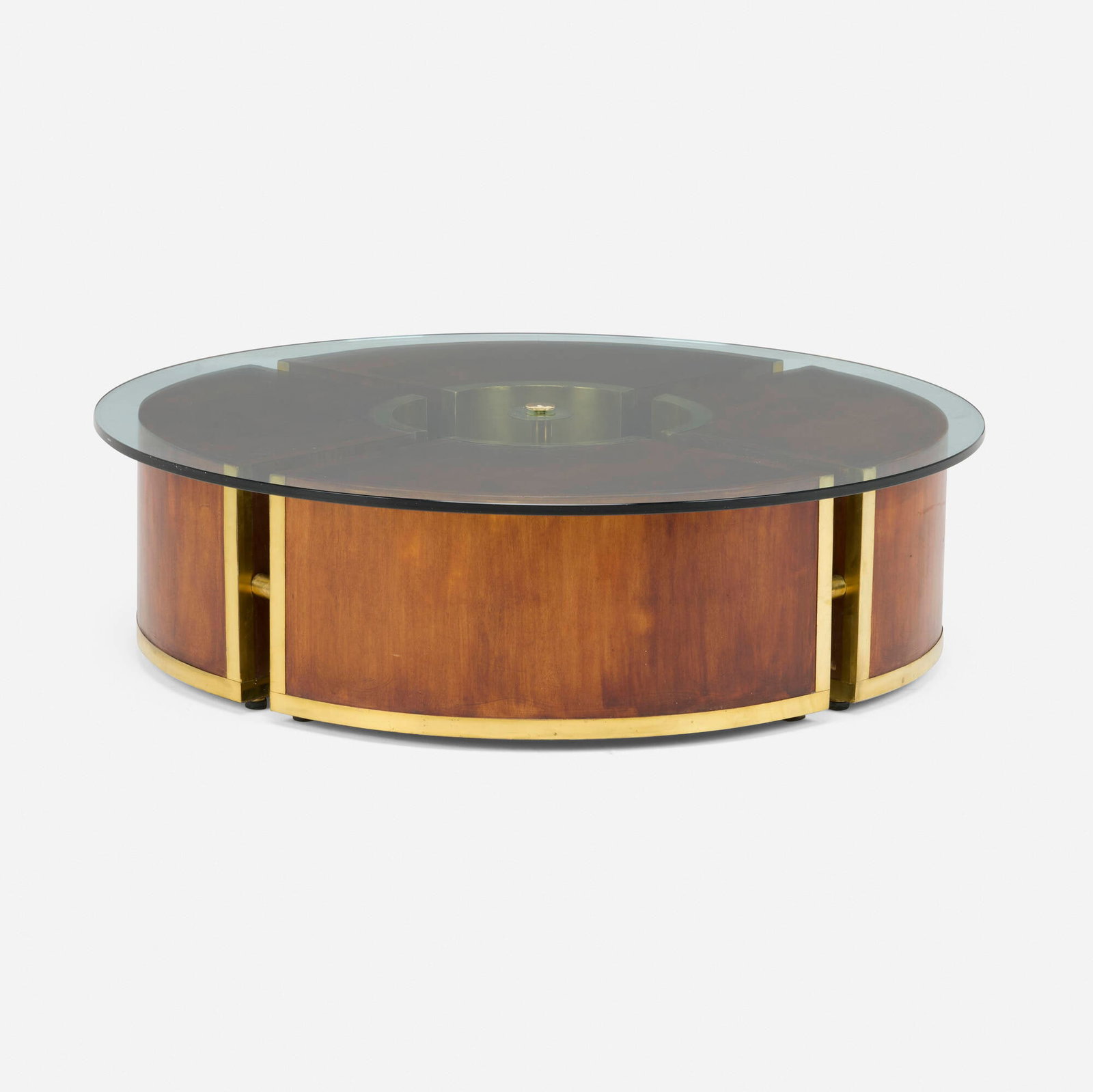 Italian, Coffee table: Italian Coffee table c. 1965 mahogany, brass, glass 14 h x 47.25 dia in (36 x 120 cm) This work will ship from Lambertville, New Jersey.