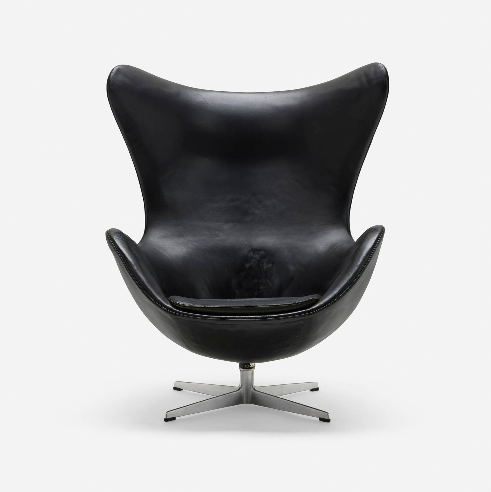 Arne Jacobsen, Egg chair: Arne Jacobsen Egg chair Fritz Hansen Denmark, 1958 leather, cast aluminum, plastic 41.5 h x 34.25 w x 30 d in (105 x 87 x 76 cm) Foil manufacturer's label to underside 'FH Made in Denmark