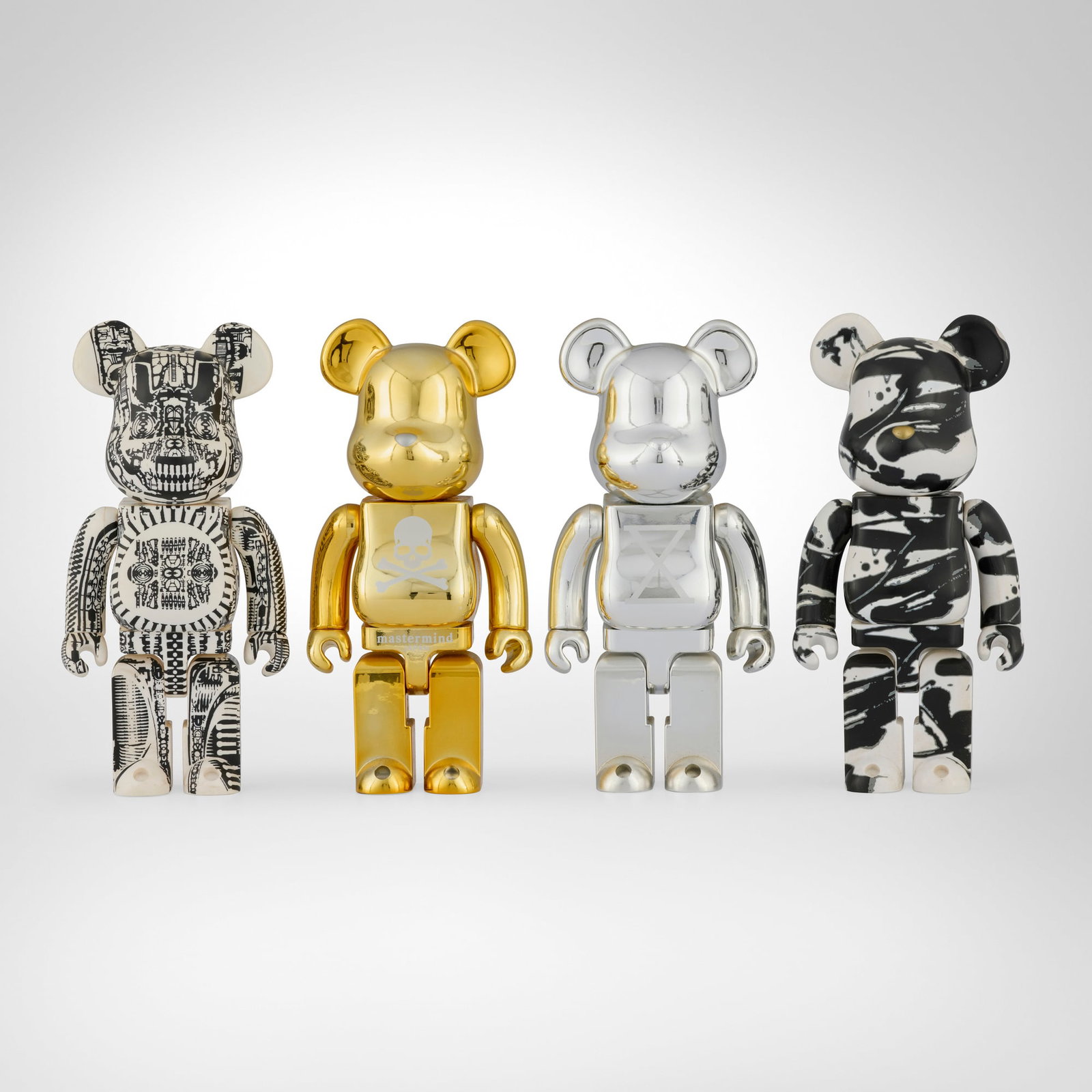 Medicom Toy, Collection of four Be@rbrick figures: Medicom Toy Collection of four Be@rbrick figures Japan, 2007-2020 painted cast vinyl 10.75 h x 5.125 w x 3.625 d in (27 x 13 x 9 cm) Collection is comprised of Be@rbrick X Gold 400% (2