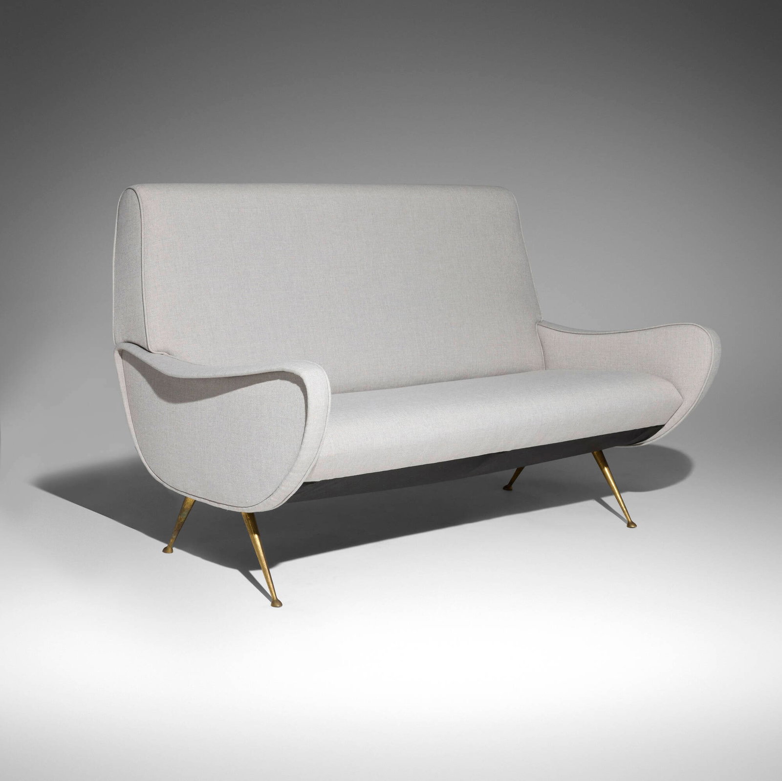 In the manner of Marco Zanuso, Settee: In the manner of Marco Zanuso Settee Italy, c. 1955 upholstery, brass 33 h x 55.5 w x 30 d in (84 x 141 x 76 cm) Provenance: Private Collection This work will ship from Chicago, Illinois.