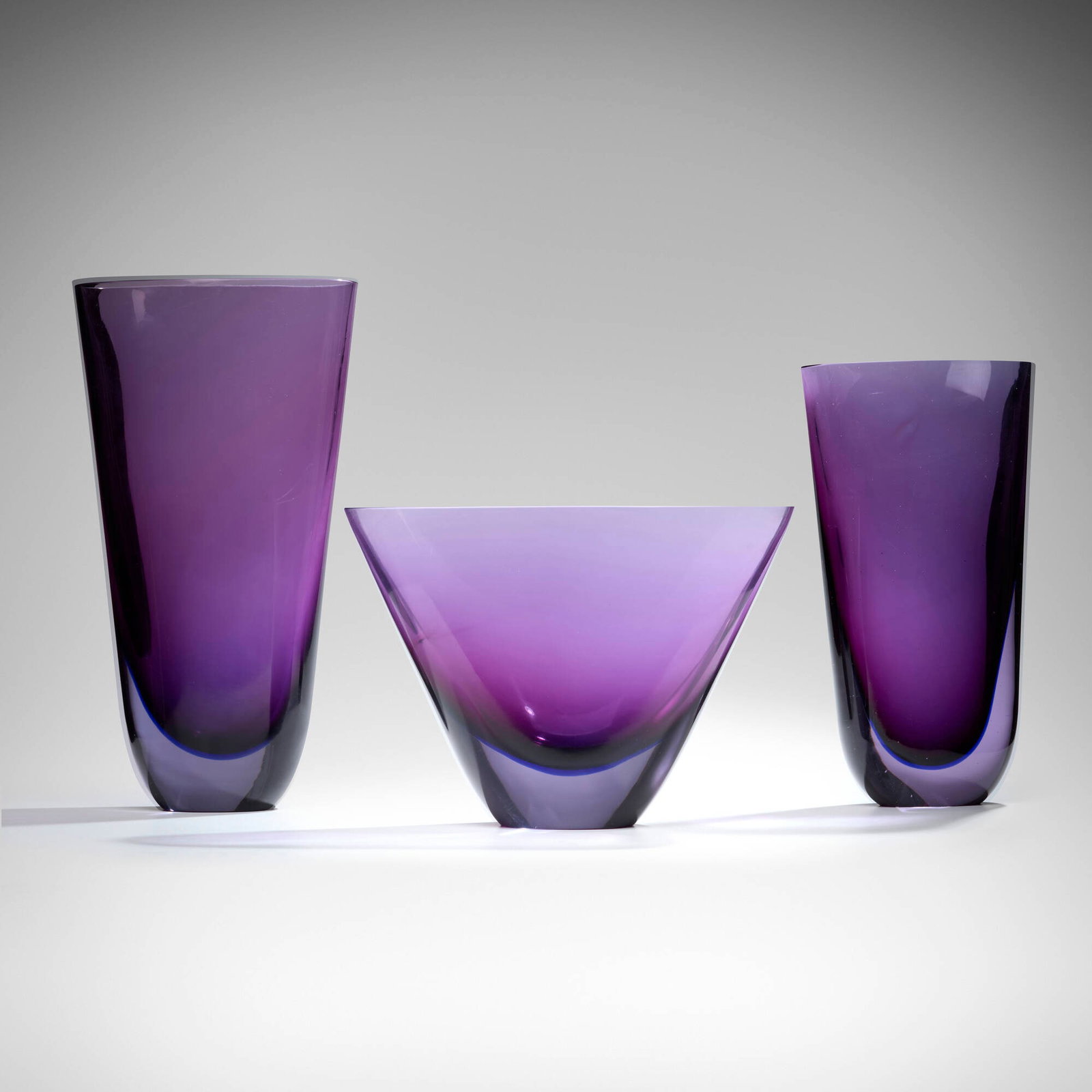 Flavio Poli, Collection of three Sommerso vases: Flavio Poli Collection of three Sommerso vases Seguso Vetri d'Arte Italy, c. 1957 glass 19 h x 10.25 w x 5.625 d in (48 x 26 x 14 cm) 16 h x 8.5 w x 4.625 d in (41 x 22 x 12 cm) 10.875 h x 15.25 w x