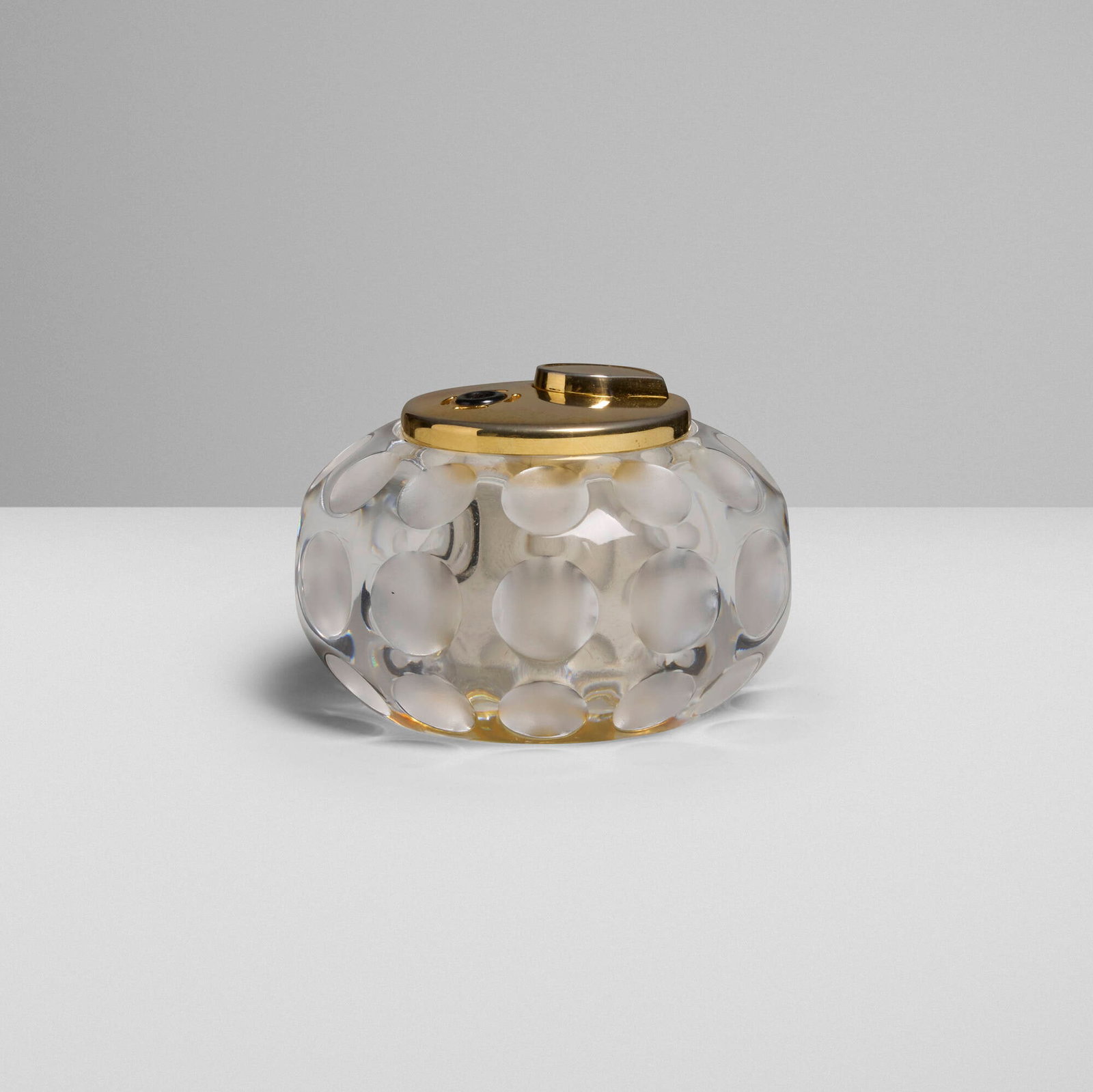Cristal de Sevres, Table lighter: Cristal de Sevres Table lighter France, mid-20th century crystal, gilt metal 2.25 h x 3.5 dia in (6 x 9 cm) Etched manufacturer's mark to underside 'Sevres Cristal France'.
