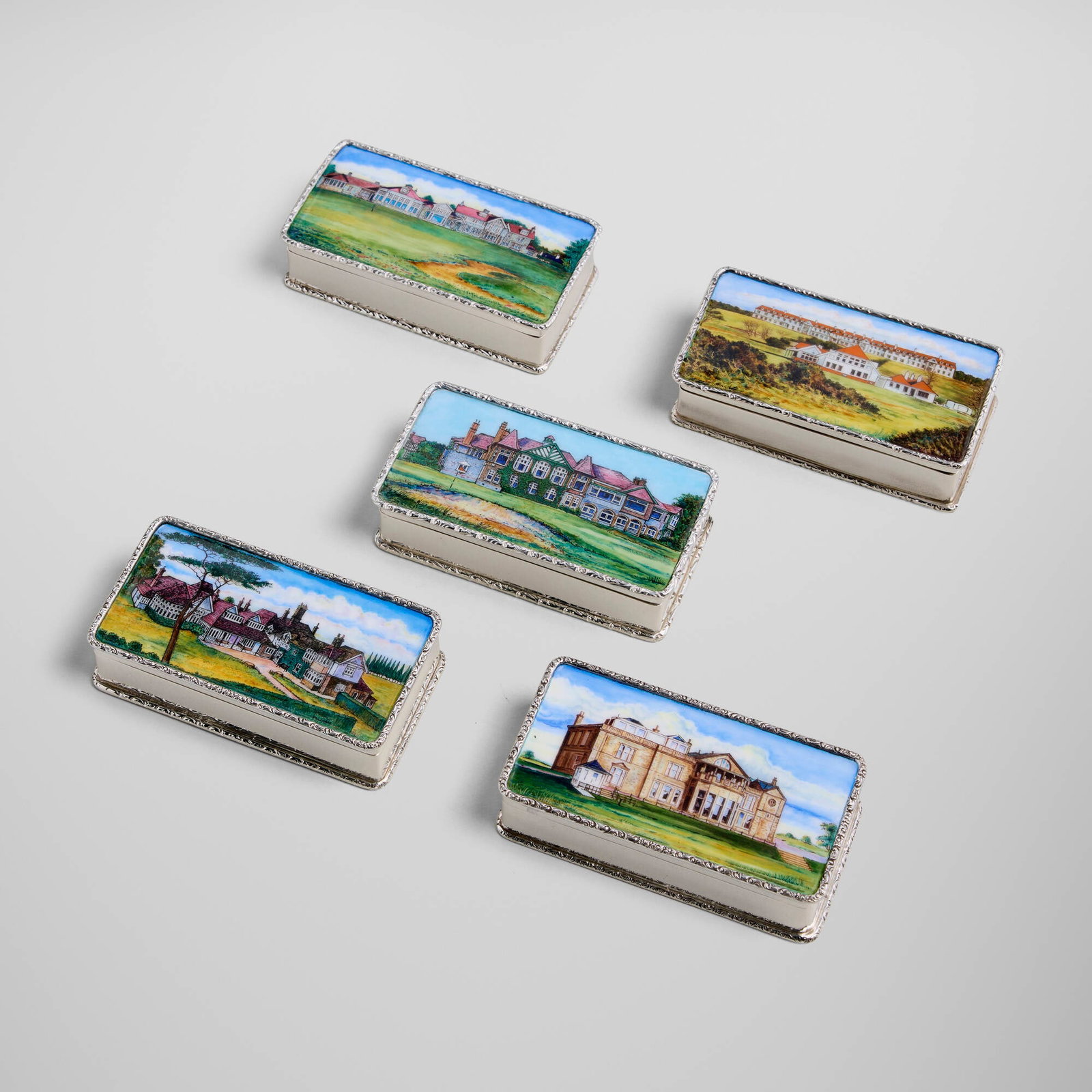Garrard & Co., Collection of five 'Great Golf Courses' Elizabeth II snuff boxes: Garrard & Co. Collection of five 'Great Golf Courses' Elizabeth II snuff boxes Birmingham, United Kingdom, 1985, 1986 silver parcel-gilt, enamel 1 h x 3.75 w x 2 d in (3 x 10 x 5 cm) Collection