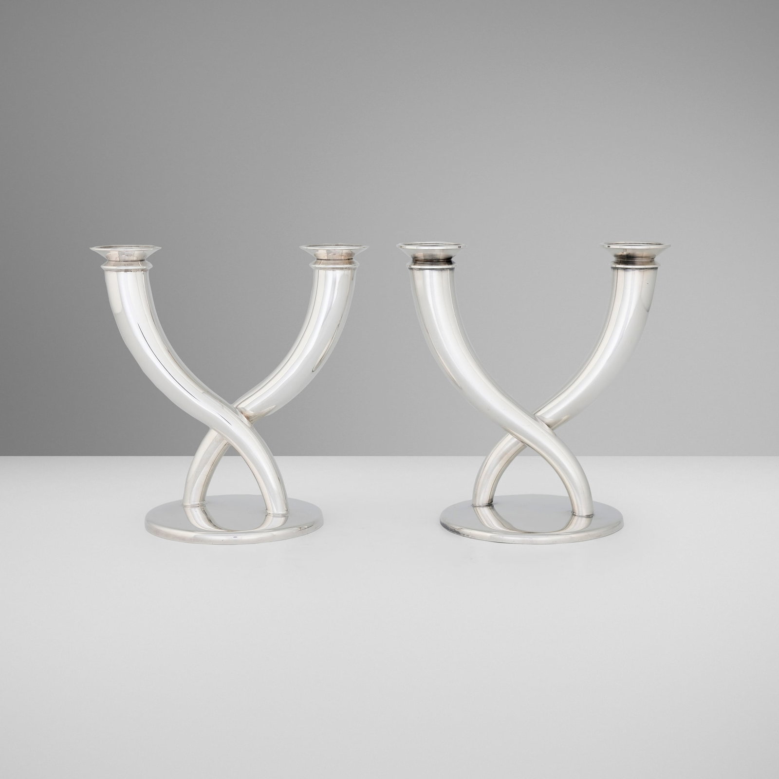 Gio Ponti, Gallia candelabra, pair: Gio Ponti Gallia candelabra, pair Christofle Italy, 1935 / c. 1990 silver-plated metal 8 h x 7.75 w x 5.25 d in (20 x 20 x 13 cm) Impressed manufacturer's mark to each example 'Christofle' and