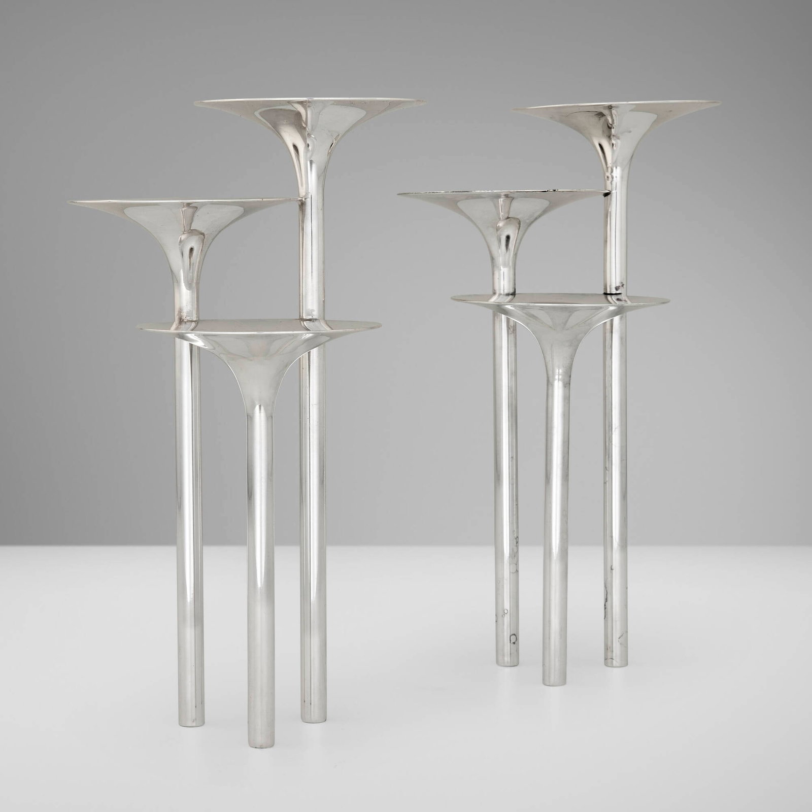 Lino Sabattini, Gallia Concerto di Trombe candle holders, pair: Lino Sabattini Gallia Concerto di Trombe candle holders, pair Christofle Italy, 1964 / before 1983 silver-plated metal 9.25 h x 4.75 w x 5.25 d in (23 x 12 x 13 cm) Impressed manufacturer's mark