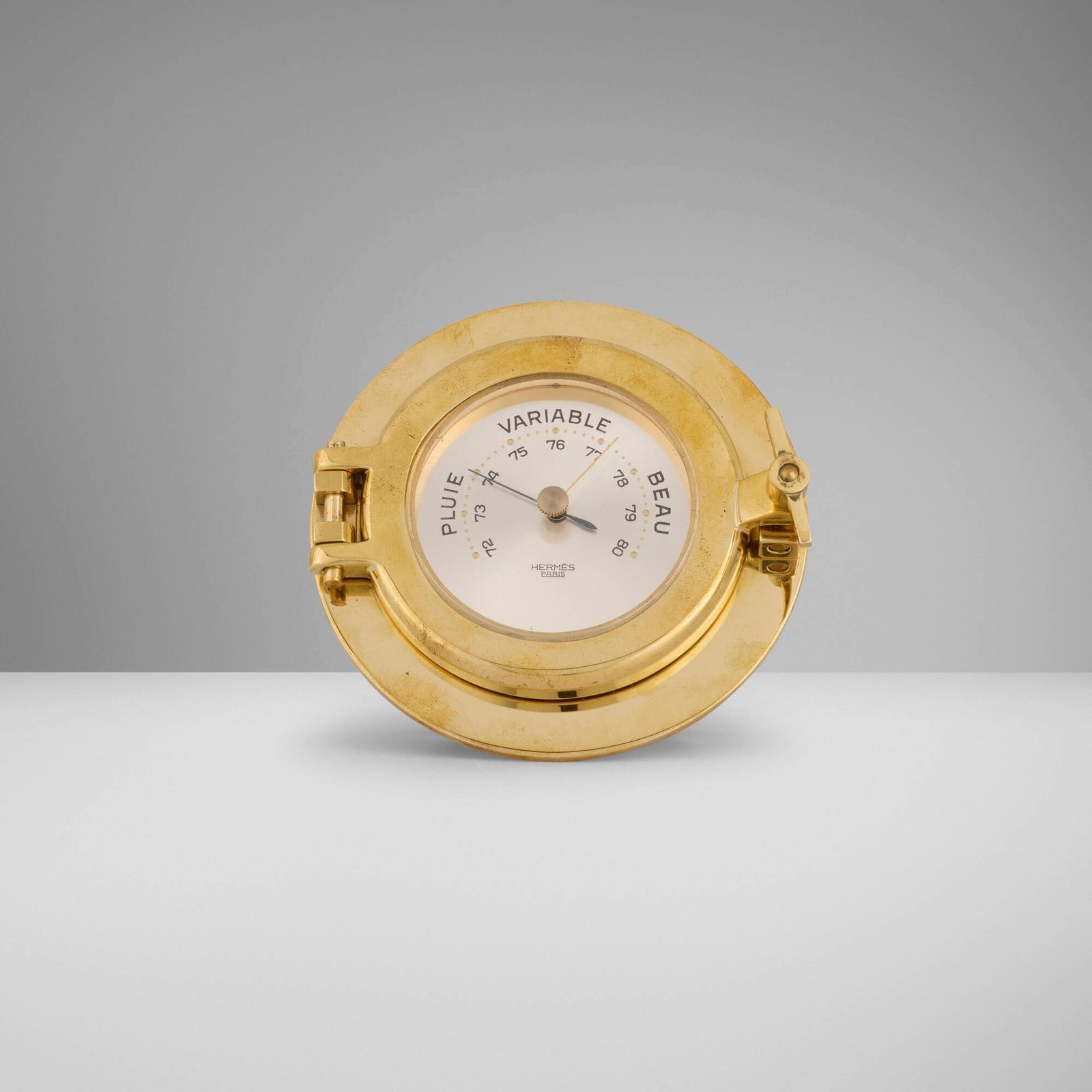 Hermes, Porthole barometer: Hermes Porthole barometer France, c. 1940 gilt brass, glass 3.375 h x 3.75 w x 2.375 d in (9 x 10 x 6 cm) Printed manufacturer's mark to face 'Hermes Paris'. This work will ship from