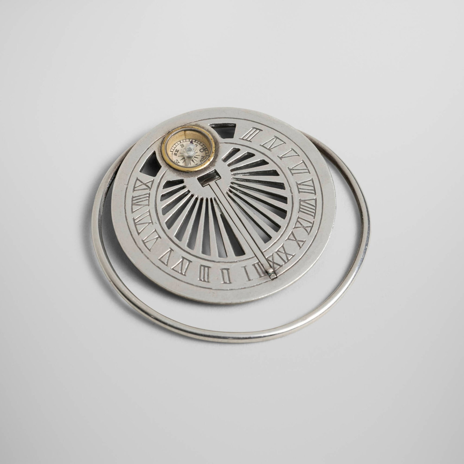 Mappin & Webb, Men's multifunctional pocket accessory: Mappin & Webb Men's multifunctional pocket accessory United Kingdom / France, c. 1950 .800 silver, silvered metal, brass 2 h x 2.125 w x 0.25 d in (5 x 5 x 1 cm) Accessory functions as a compas