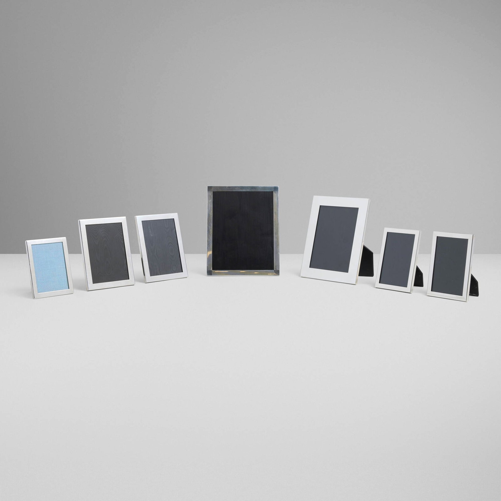 Tiffany & Co., Collection of seven picture frames: Tiffany & Co. Collection of seven picture frames USA, Spain, Italy, c. 2000 sterling silver, glass, leather largest: 10 h x 8 w x 0.5 d in (25 x 20 x 1 cm) smallest: 5.5 h x 4 w x 0.5 d in (14 x 10 x
