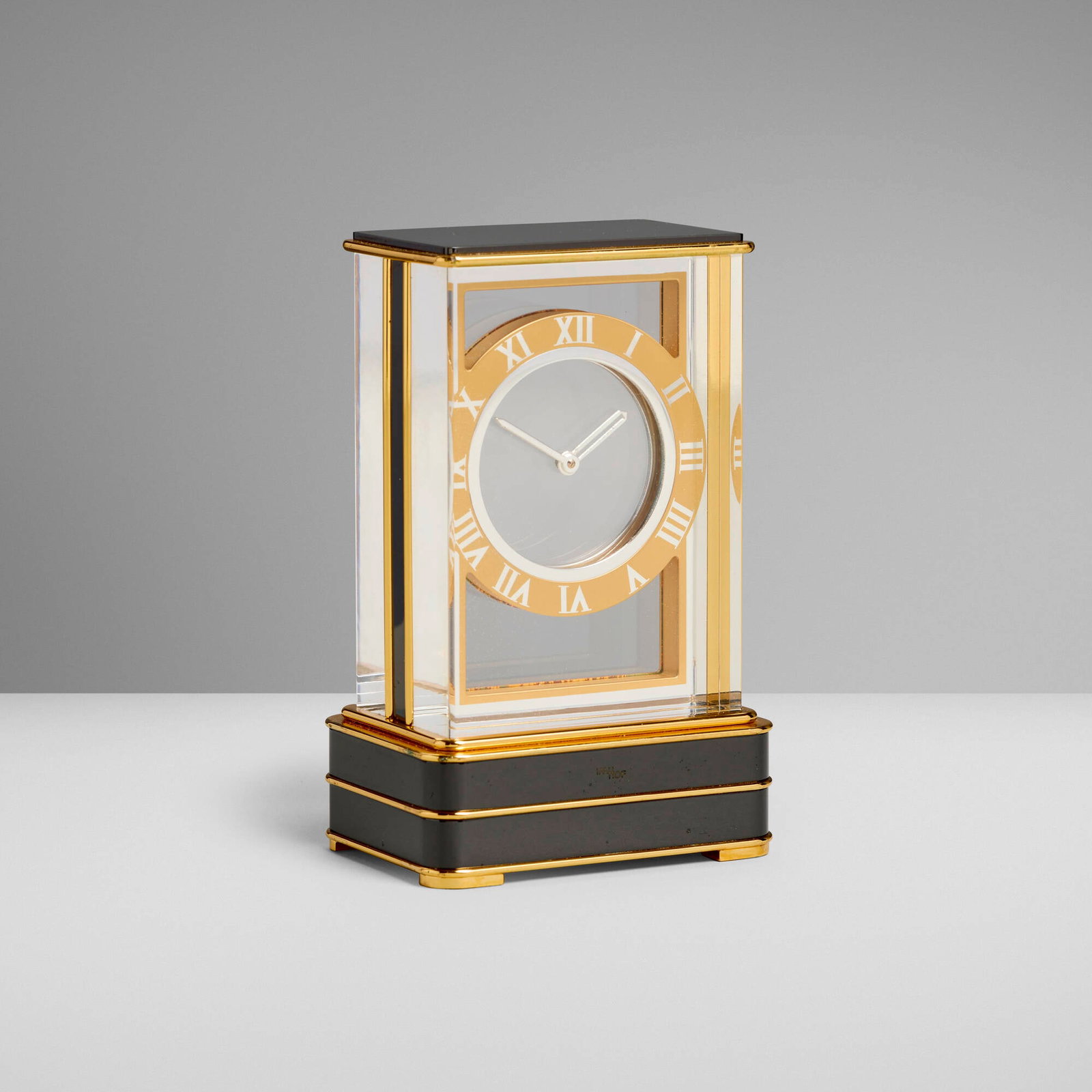 Imhof, Mystery clock: Imhof Mystery clock Switzerland, c. 1980 glass, lacquered metal, gilt metal 6 h x 3.75 w x 2.75 d in (15 x 10 x 7 cm) Printed manufacturer's mark to clock base 'Imhof'. Sold with