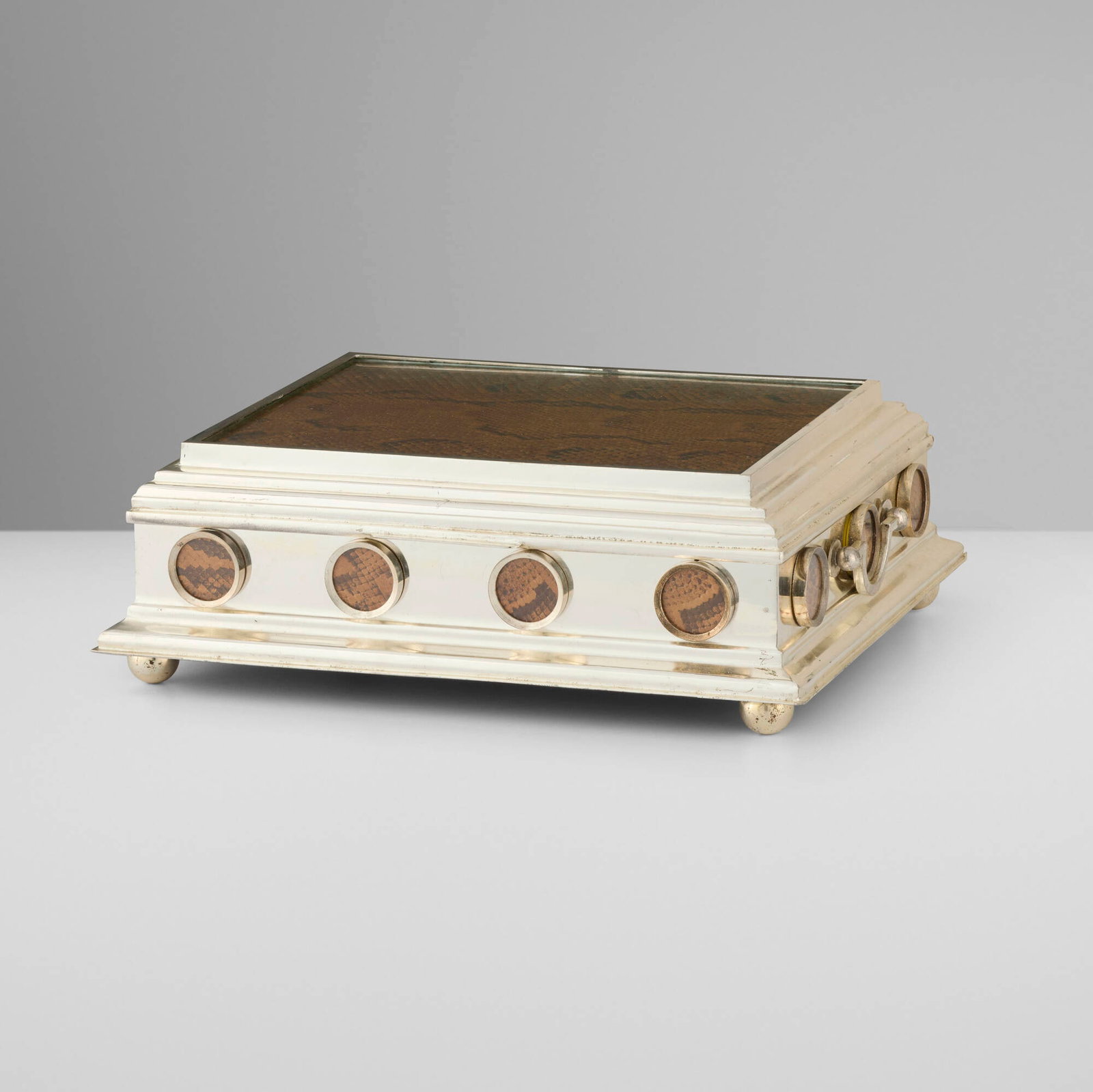 Dunhill, Playing card box: Dunhill Playing card box United Kingdom, c. 1970 silver-plated steel, snakeskin, glass 4.5 h x 13.125 w x 10.75 d in (11 x 33 x 27 cm) Box features four interior wood compartments. Impressed
