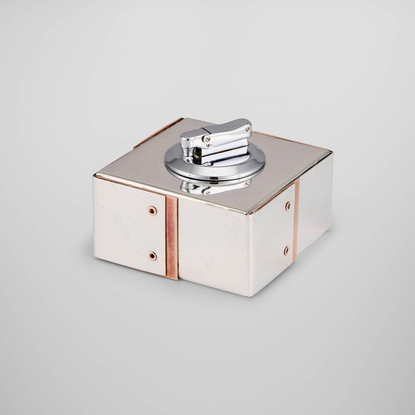 Afra and Tobia Scarpa, Table lighter: Afra and Tobia Scarpa Table lighter San Lorenzo Italy, 1973 sterling silver, copper 2.5 h x 3.375 w x 3.375 d in (6 x 9 x 9 cm) Impressed maker's marks to underside '925'. 12.03 ozt.