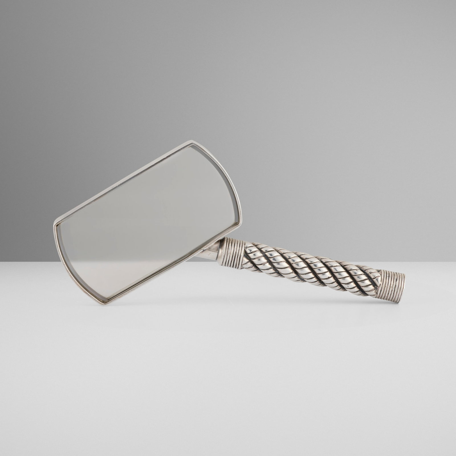 Hermes, Cordage magnifying glass: Hermes Cordage magnifying glass Ravinet d'Enfert & Cie France, c. 1965 silver-plated metal, glass 5.625 h x 6.5 w x 0.625 d in (14 x 17 x 2 cm) Impressed manufacturer's mark to edge 'Hermes