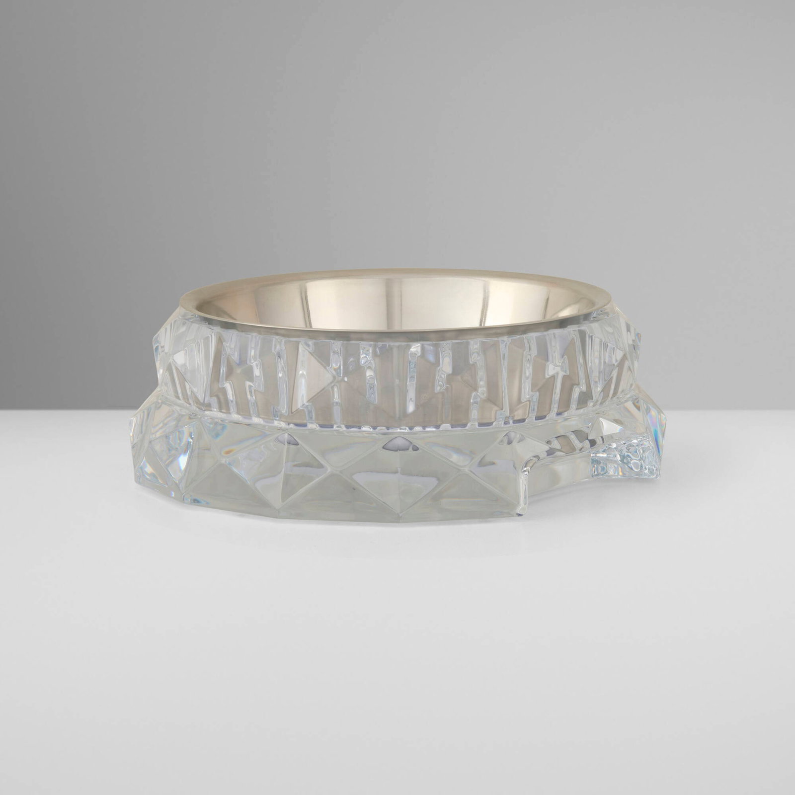 Baccarat, Louxor pet bowl: Baccarat Louxor pet bowl France, c. 2015 stainless steel, cut crystal, PVC 2.875 h x 8.25 w x 8.625 d in (7 x 21 x 22 cm) This work was designed by Thomas Bastide. Acid-etched manufacturer'