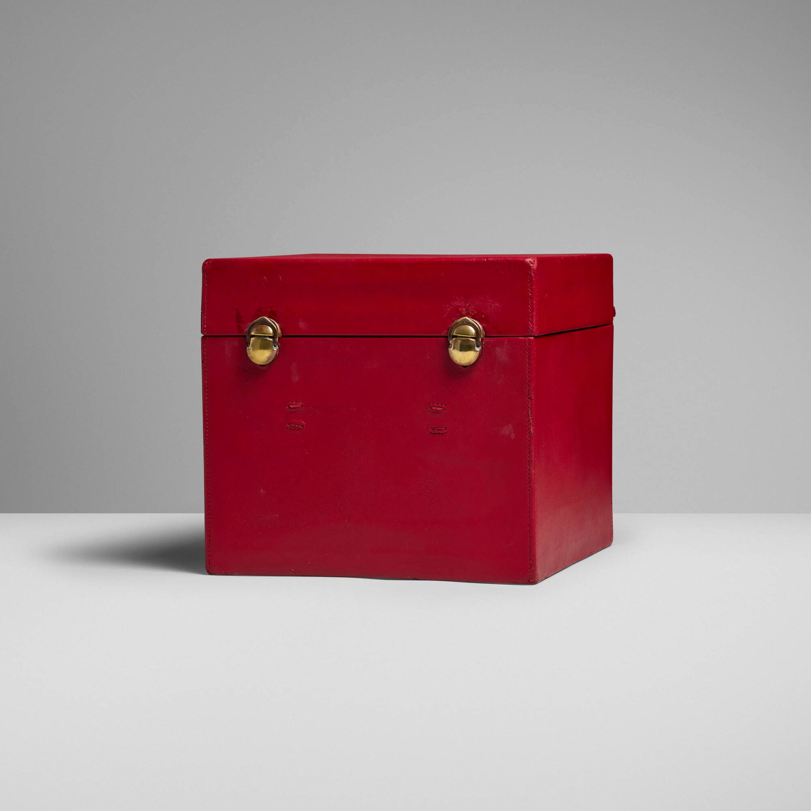Louis Vuitton, Hat box: Louis Vuitton Hat box France, c. 1912 leather, moire silk, brass 9.125 h x 10 w x 10 d in (23 x 25 x 25 cm) Impressed manufacturer's mark to box rim 'Louis Vuitton 781383' with &