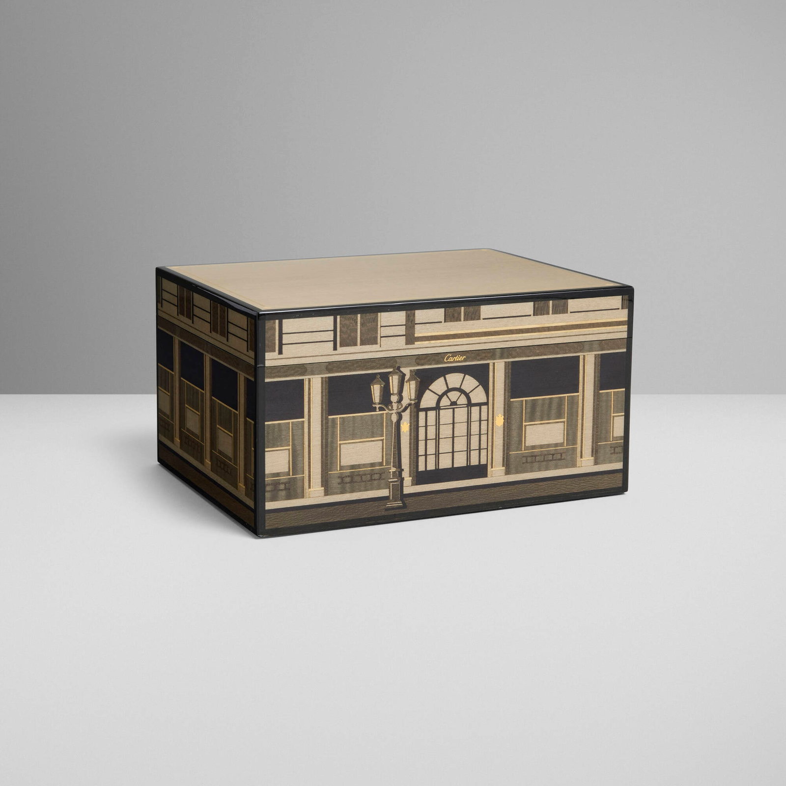 Cartier, Jewelry box with storefront marquetry design: Cartier Jewelry box with storefront marquetry design France, 21st century lacquered wood, felt, gilt metal 4.5 h x 8.5 w x 6.5 d in (11 x 22 x 17 cm) Gilt manufacturer's mark to front and