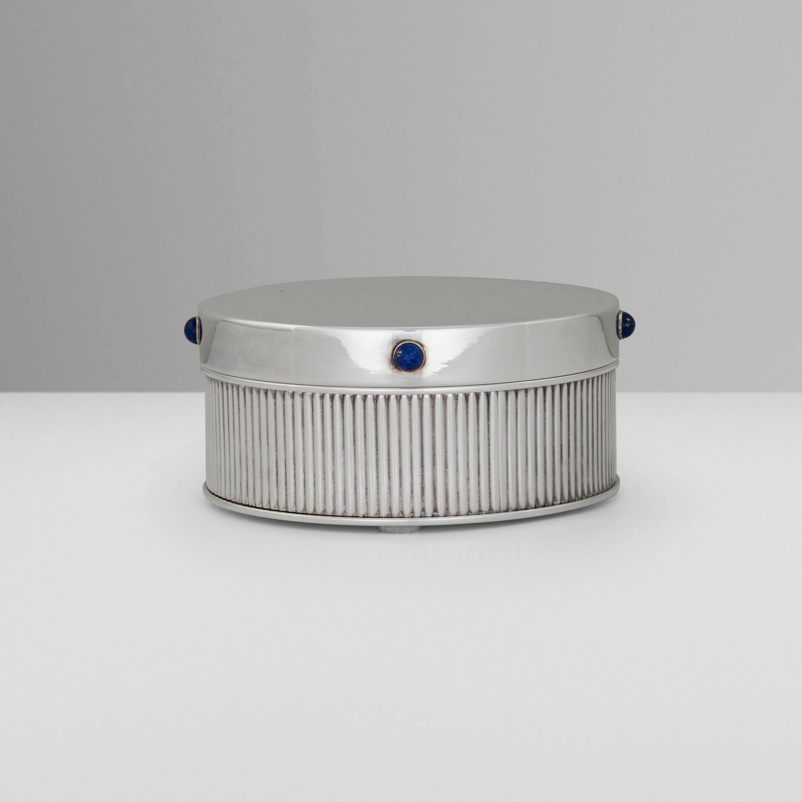 Cartier, Lapis Collection covered box: Cartier Lapis Collection covered box France / Spain, c. 1990 silver-plated metal, lapis lazuli 2 h x 4.5 dia in (5 x 11 cm) Impressed manufacturer's mark to underside 'Cartier Spain'. This work