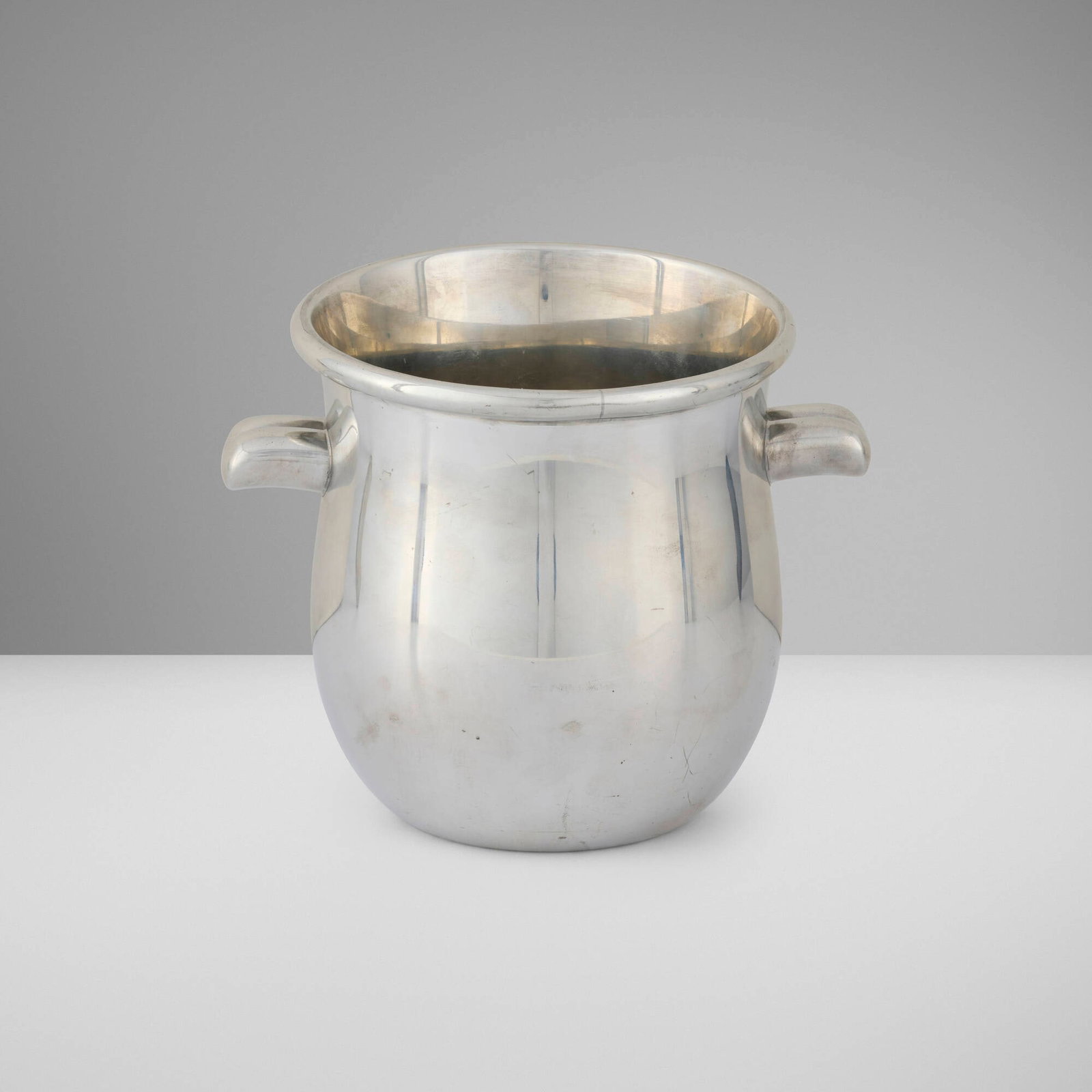 Hermes, Ice bucket: Hermes Ice bucket France, c. 1970 silvered metal 6.375 h x 7.75 w x 6 d in (16 x 20 x 15 cm) Impressed manufacturer's mark to underside 'Hermes Made in France Etain'. This work will