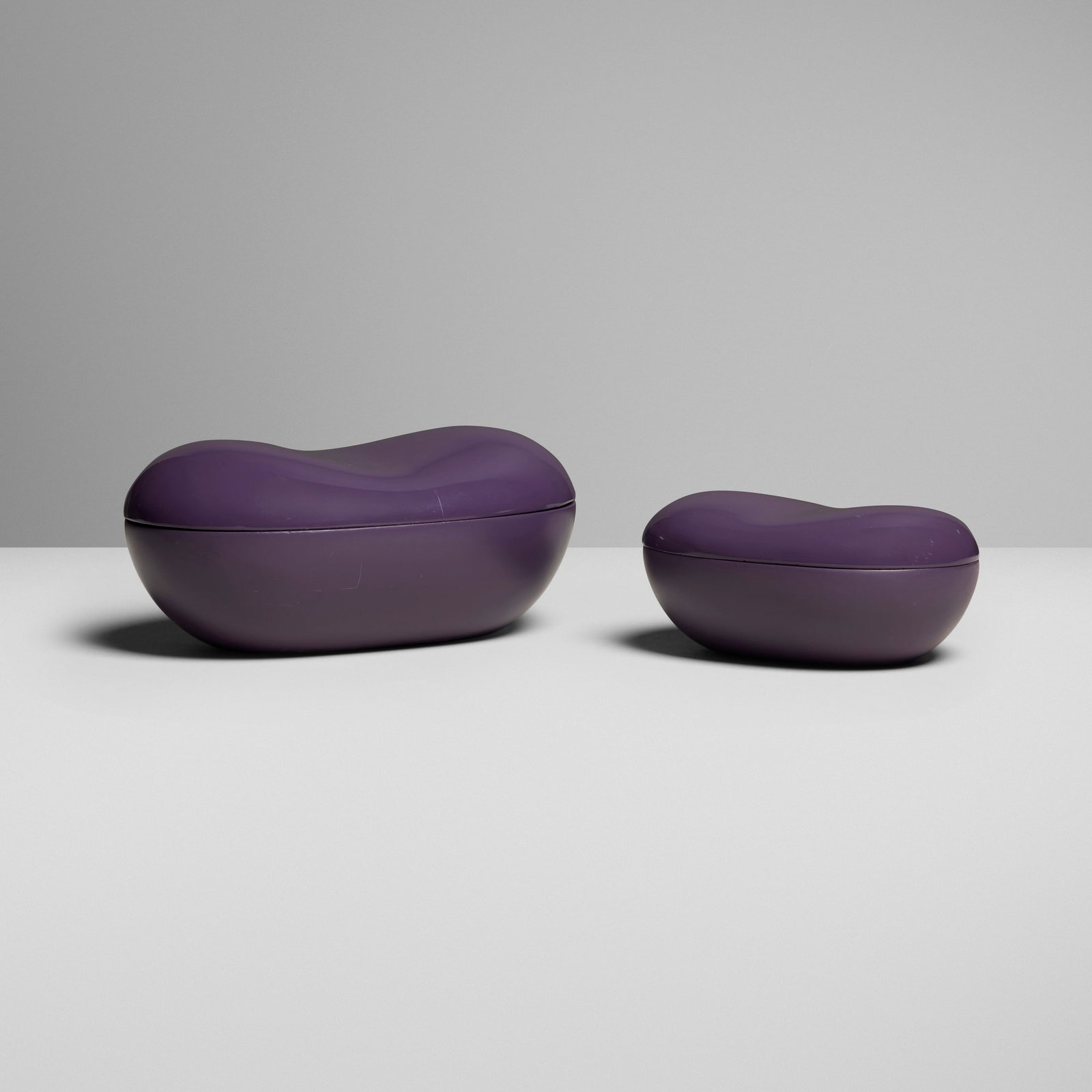 Hermes, Organic-form covered boxes, set of two: Hermes Organic-form covered boxes, set of two France, c. 1990 lacquered wenge 3.25 h x 7.125 w x 4.875 d in (8 x 18 x 12 cm) 2.375 h x 5.375 w x 3.75 d in (6 x 14 x 10 cm) Impressed