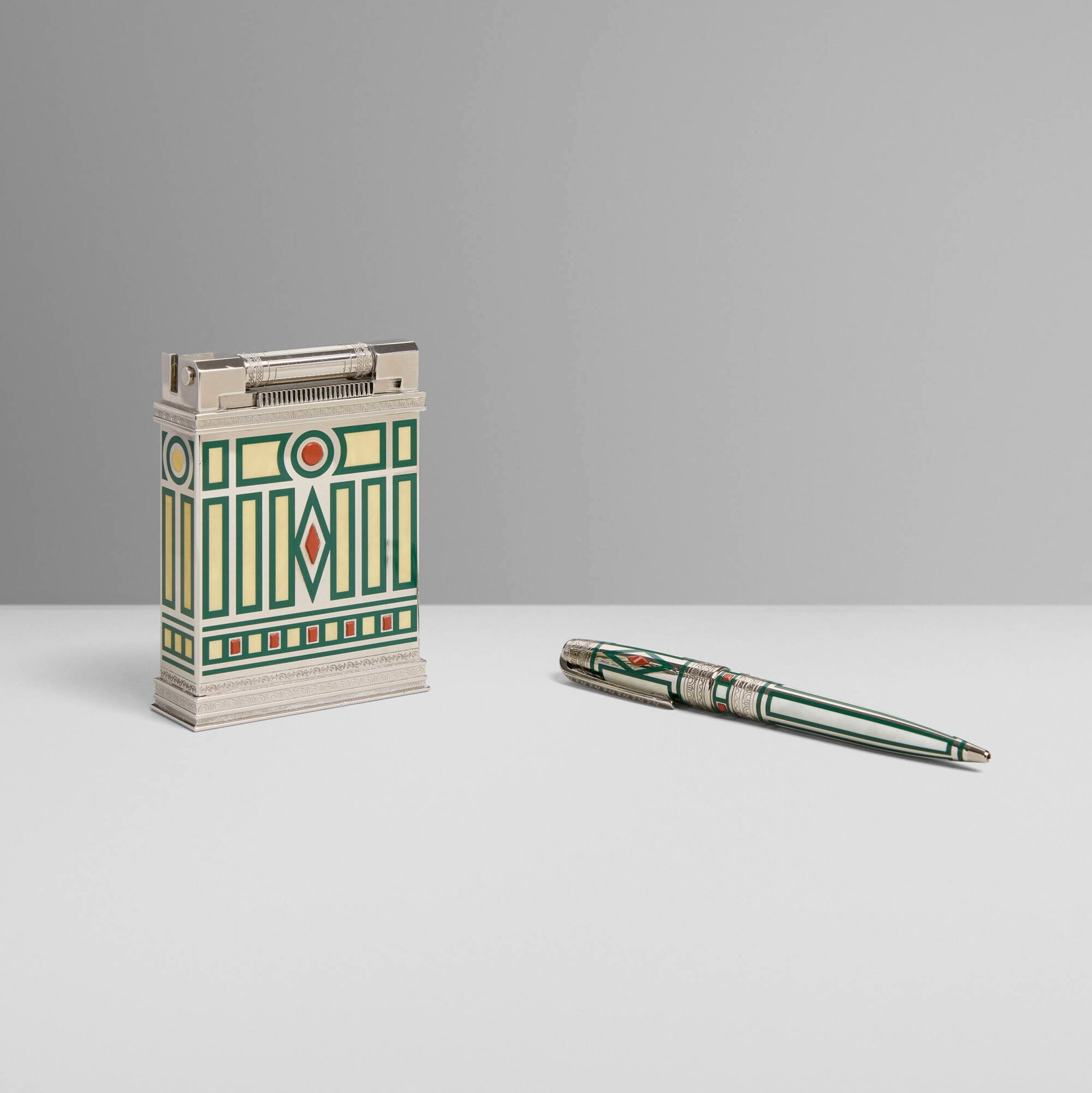 S.T. Dupont, Medici jeroboam table lighter and rollerball pen: S.T. Dupont Medici jeroboam table lighter and rollerball pen France, 2005 lacquer, silver-plated metal, red jasper 4 h x 2.75 w x 1 d in (10 x 7 x 3 cm) 5.5 h x 0.5 w x 0.5 d in (14 x 1 x 1 cm)