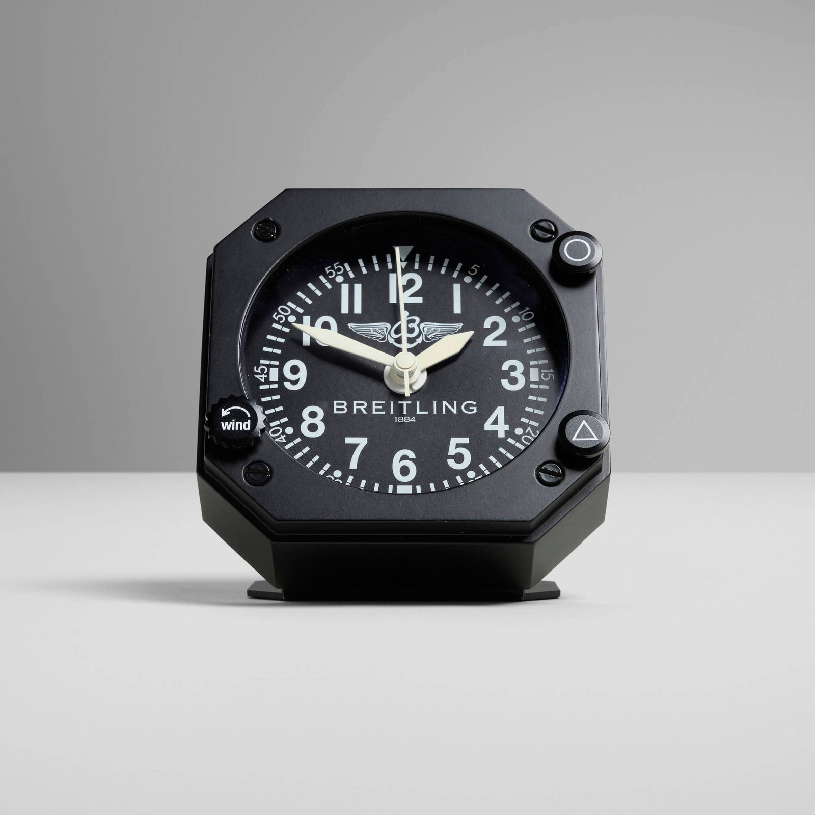 Breitling, Aviator retailer display clock: Breitling Aviator retailer display clock Switzerland, c. 2010 lacquered metal, glass 4.75 h x 4.5 w x 3.5 d in (12 x 11 x 9 cm) Printed manufacturer's mark to face 'Breitling'. S