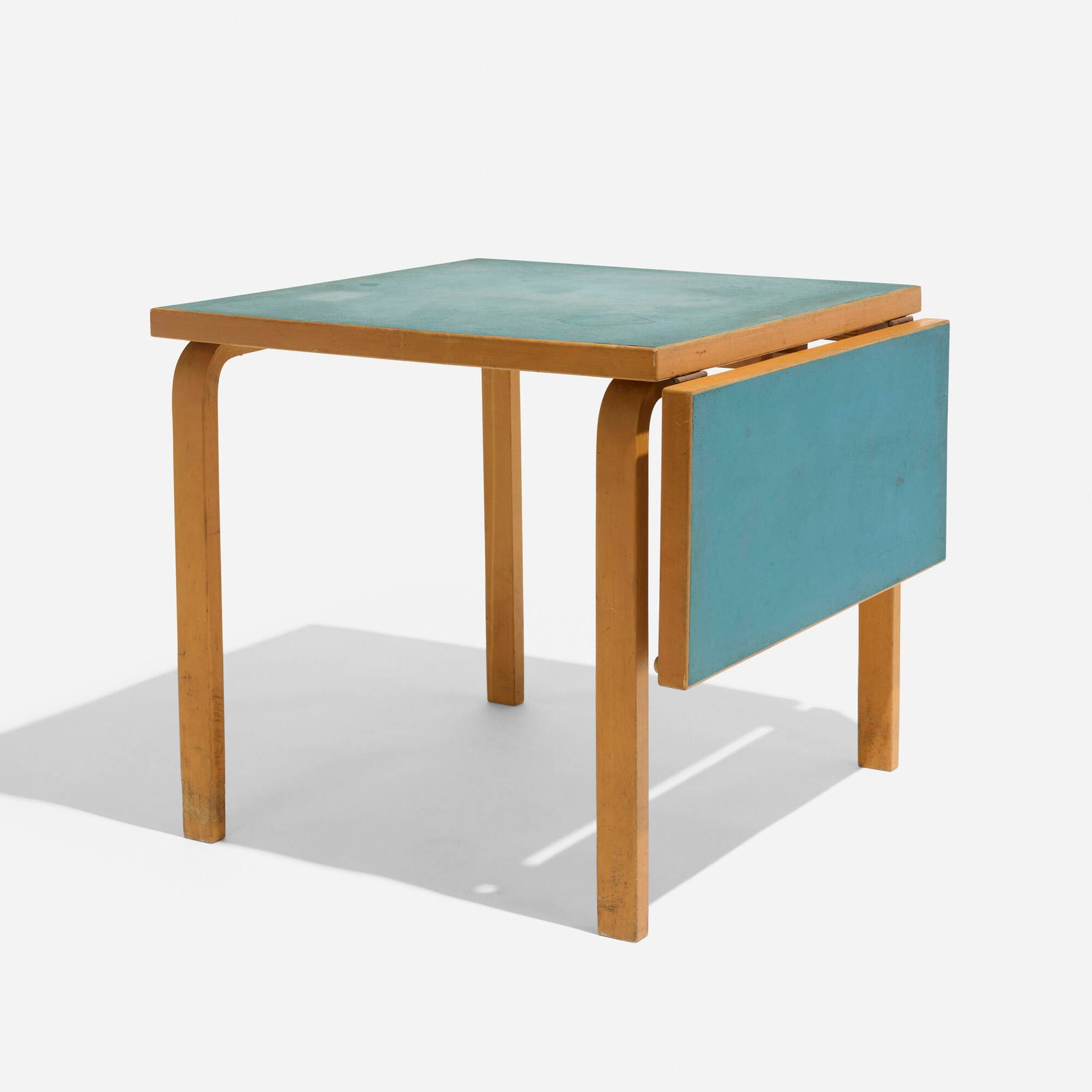 Alvar Aalto, Extension table: Alvar Aalto Extension table Artek Finland, c. 1935 birch, painted wood 28 h x 31.5 w x 30 d in (71 x 80 x 76 cm) Table features a 13.75-inch drop-down leaf; table measures 43.75 inches when fully